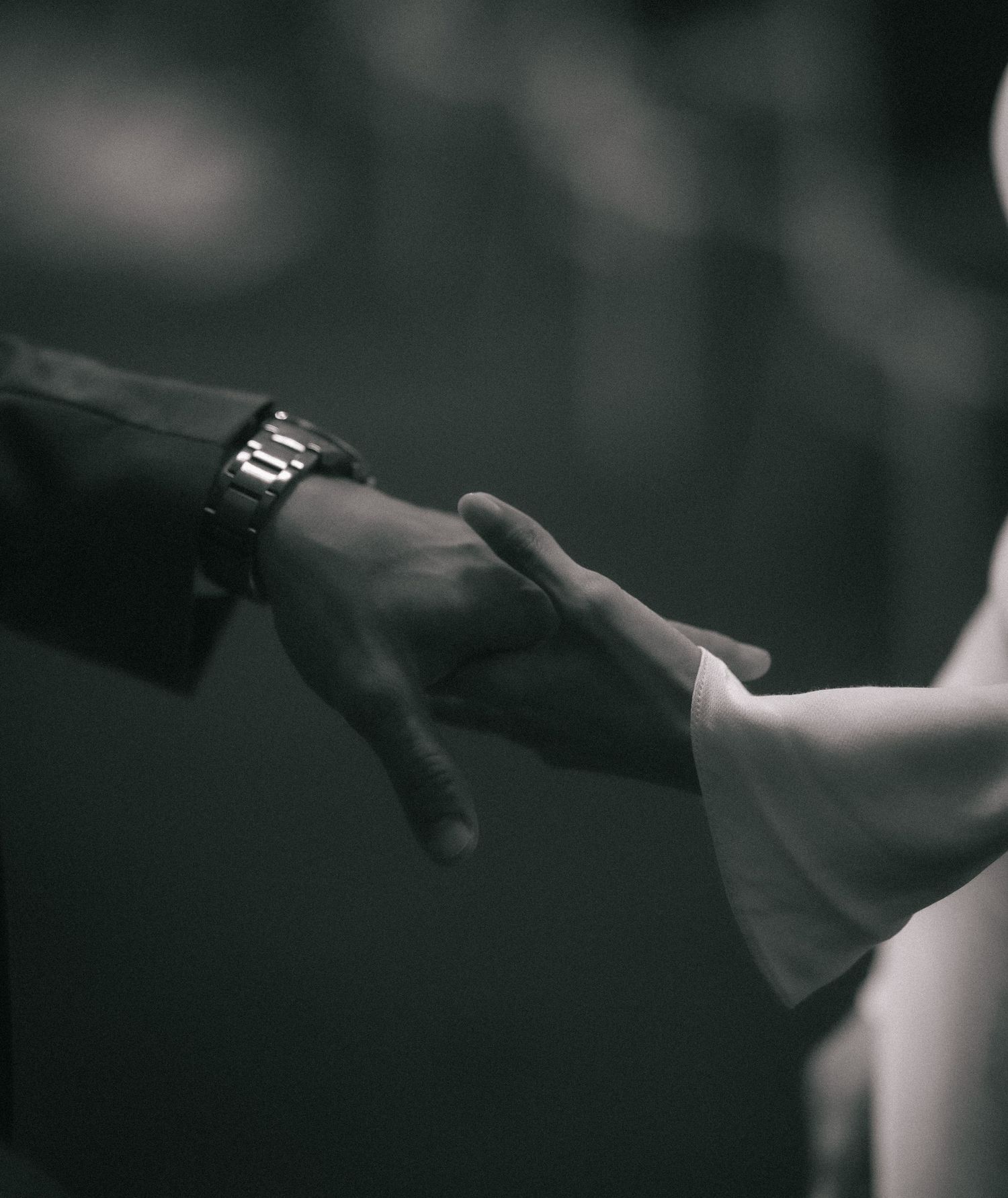 Bride and groom holding hands