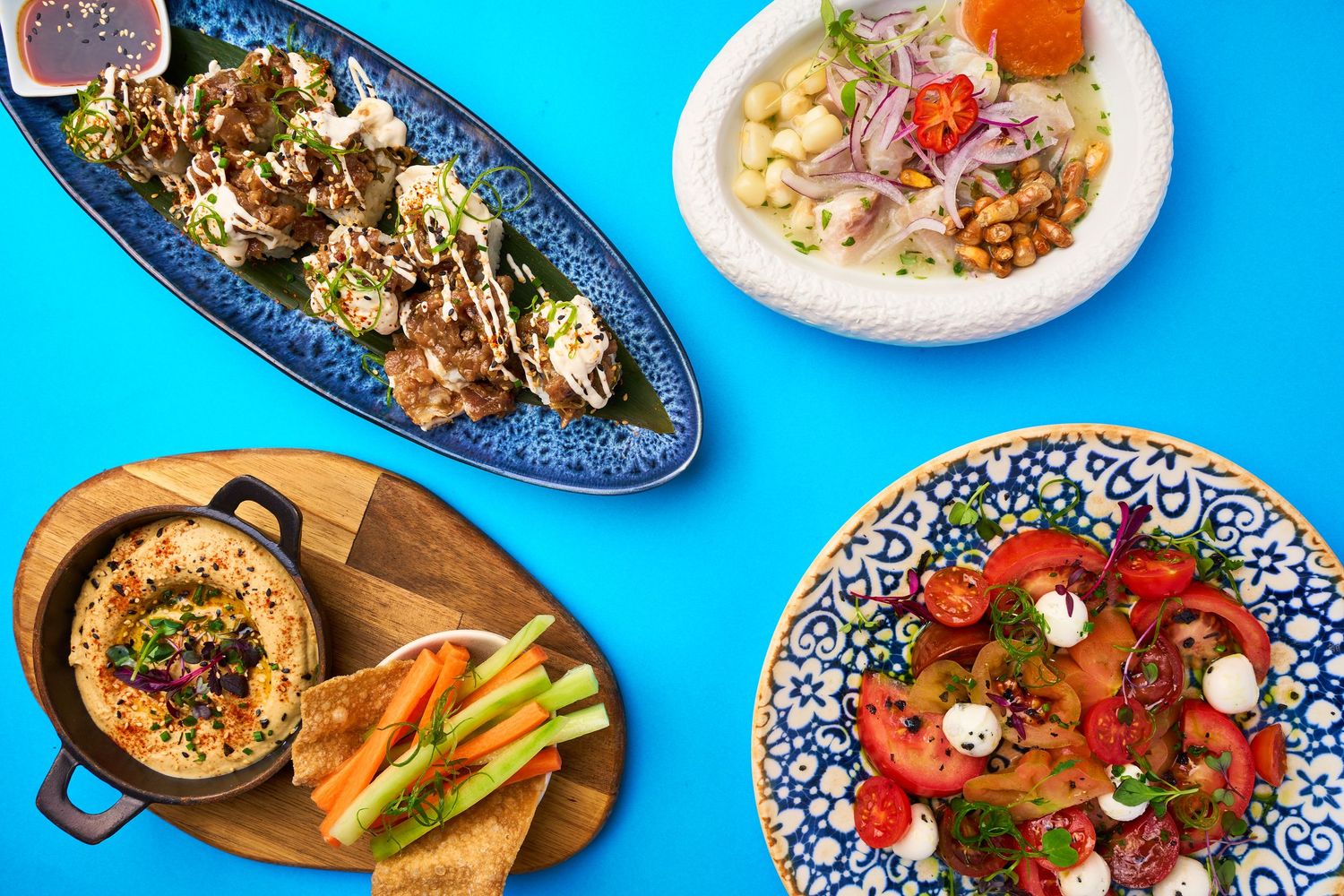 Fotografía gastronómica de varios platos de comida mediterránea
