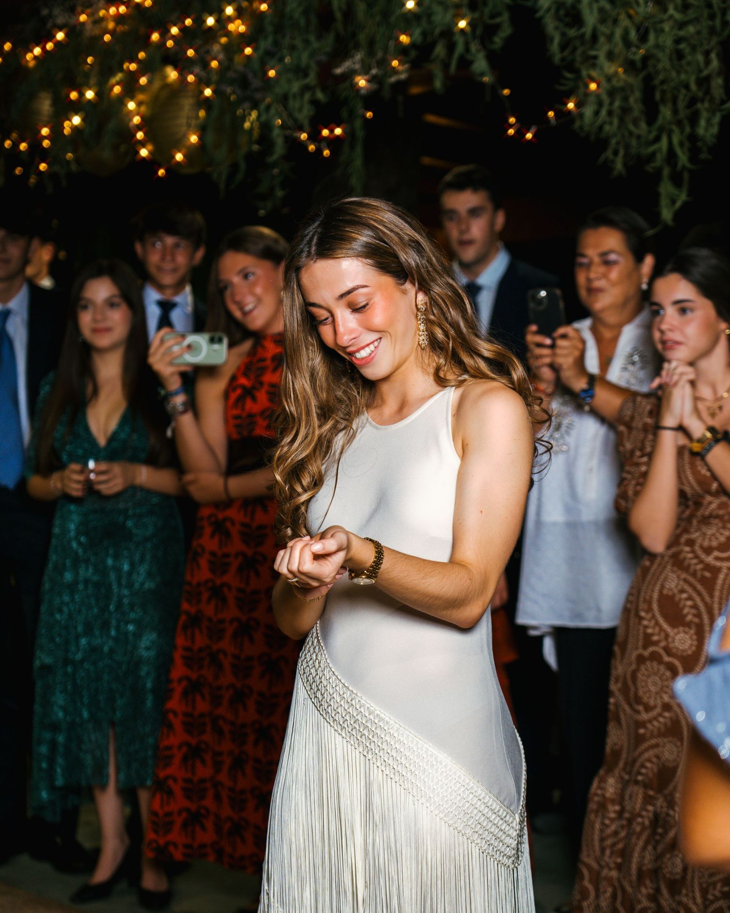 Cumpleañera bailando durante la celebración de su boda