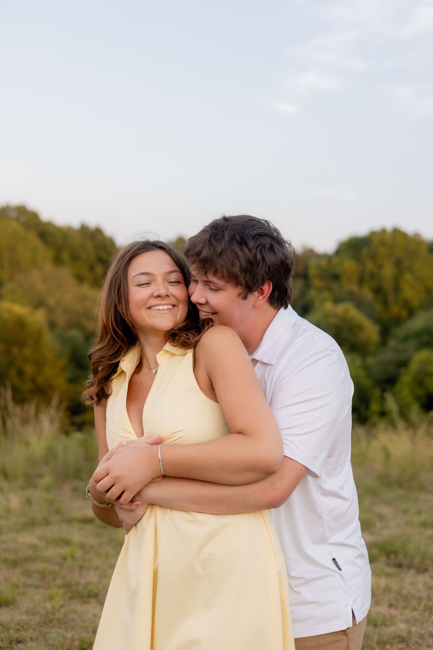 Raleigh, NC couples photography session featuring a couple embracing outdoors