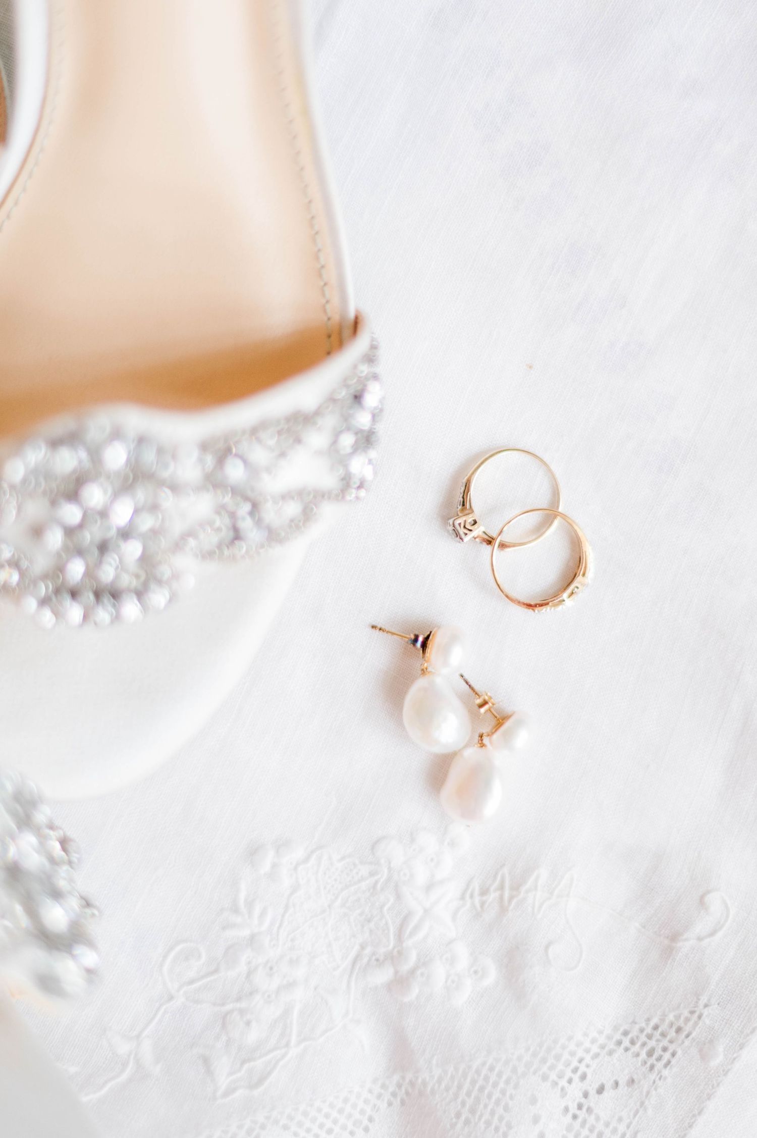 Gold wedding jewelry and shoes for catholic wedding at Holy Family Cathedral in Tulsa, OK.