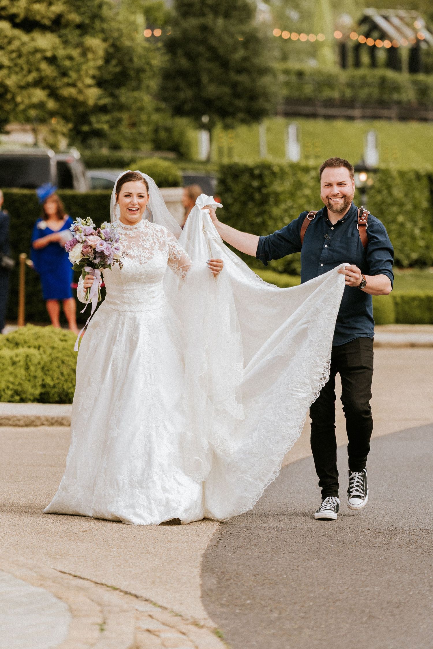 A wedding dress train flows gracefully across a paved walkway in a series of candid outdoor shots.