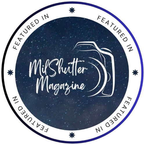 Five navy blue oval badges with white text and stars arranged in a row showing magazine or publication branding.