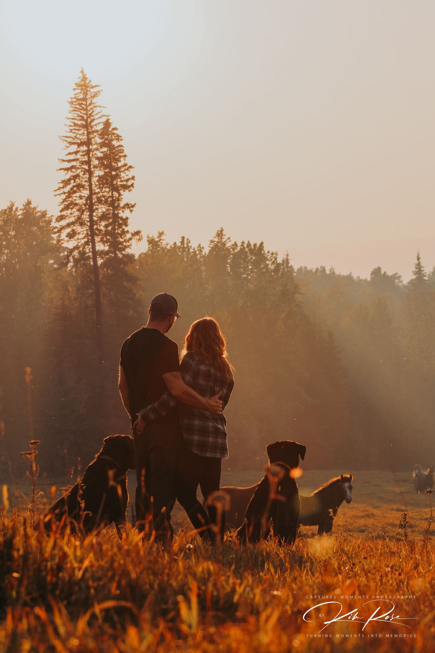 Couple holding hands and strolling along a serene beach in Fort St John at twilight