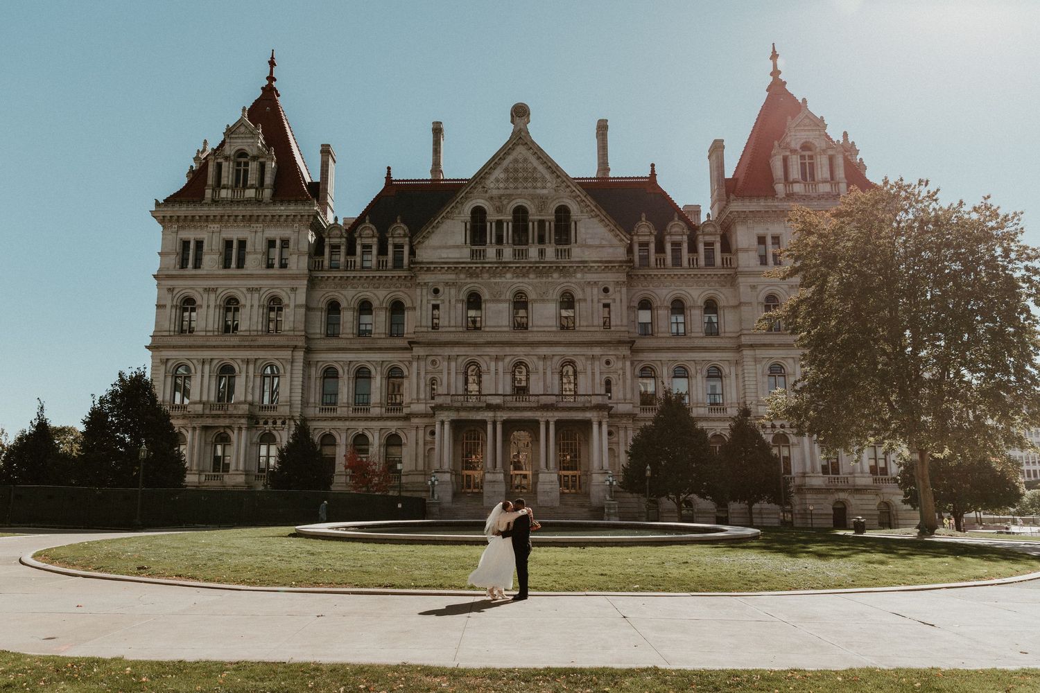 Panoramic view of a grand Victorian Gothic mansion with ornate architectural details.