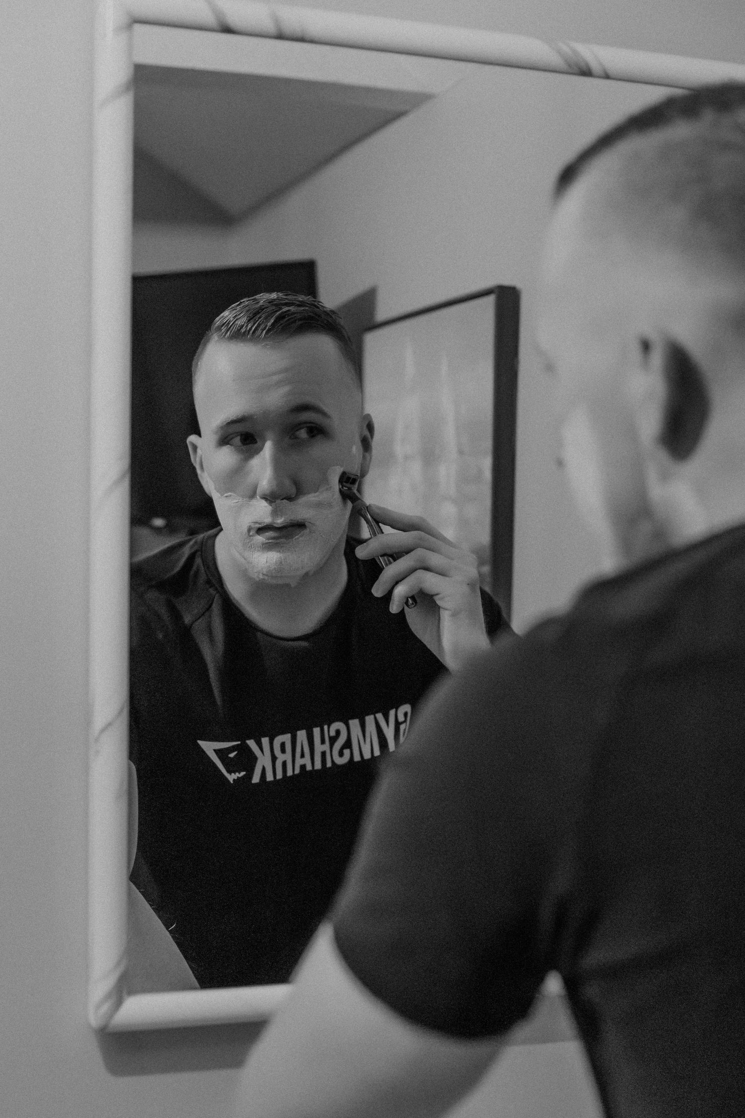lakes region elopement groom getting ready black and white