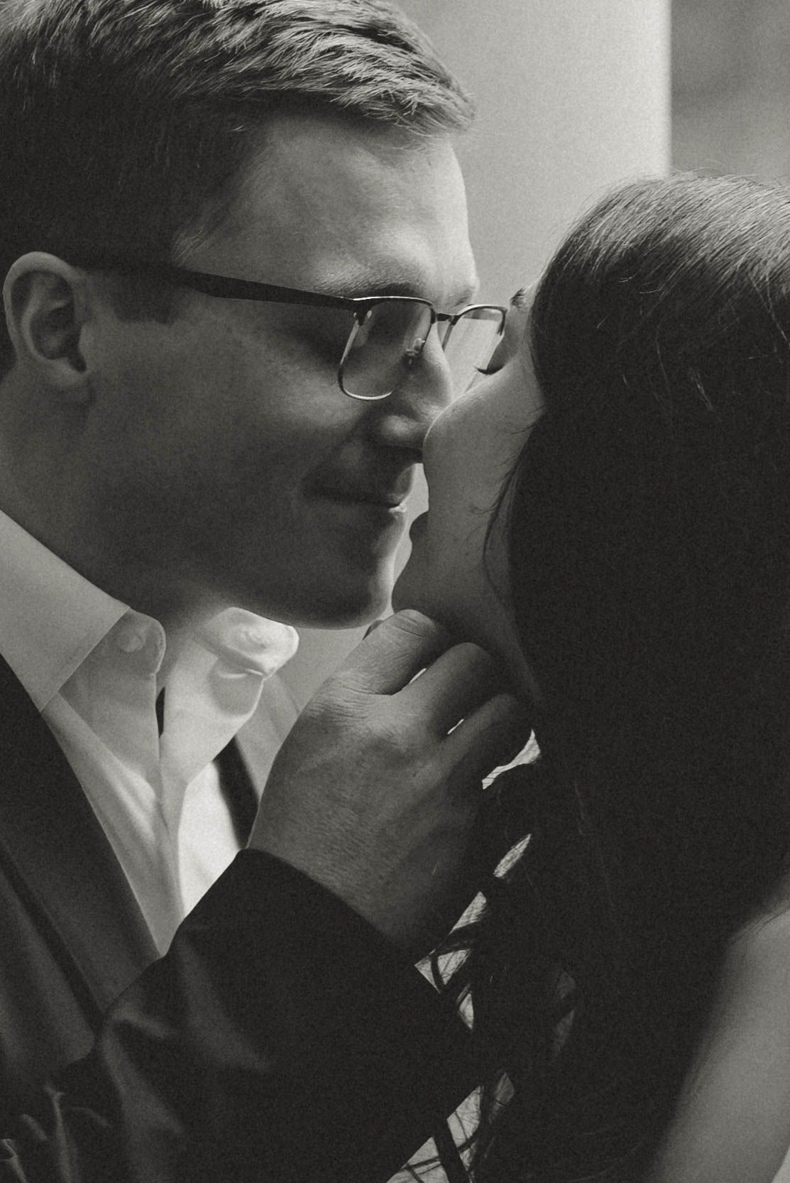 A series of black and white profile shots showing two people in intimate conversation.