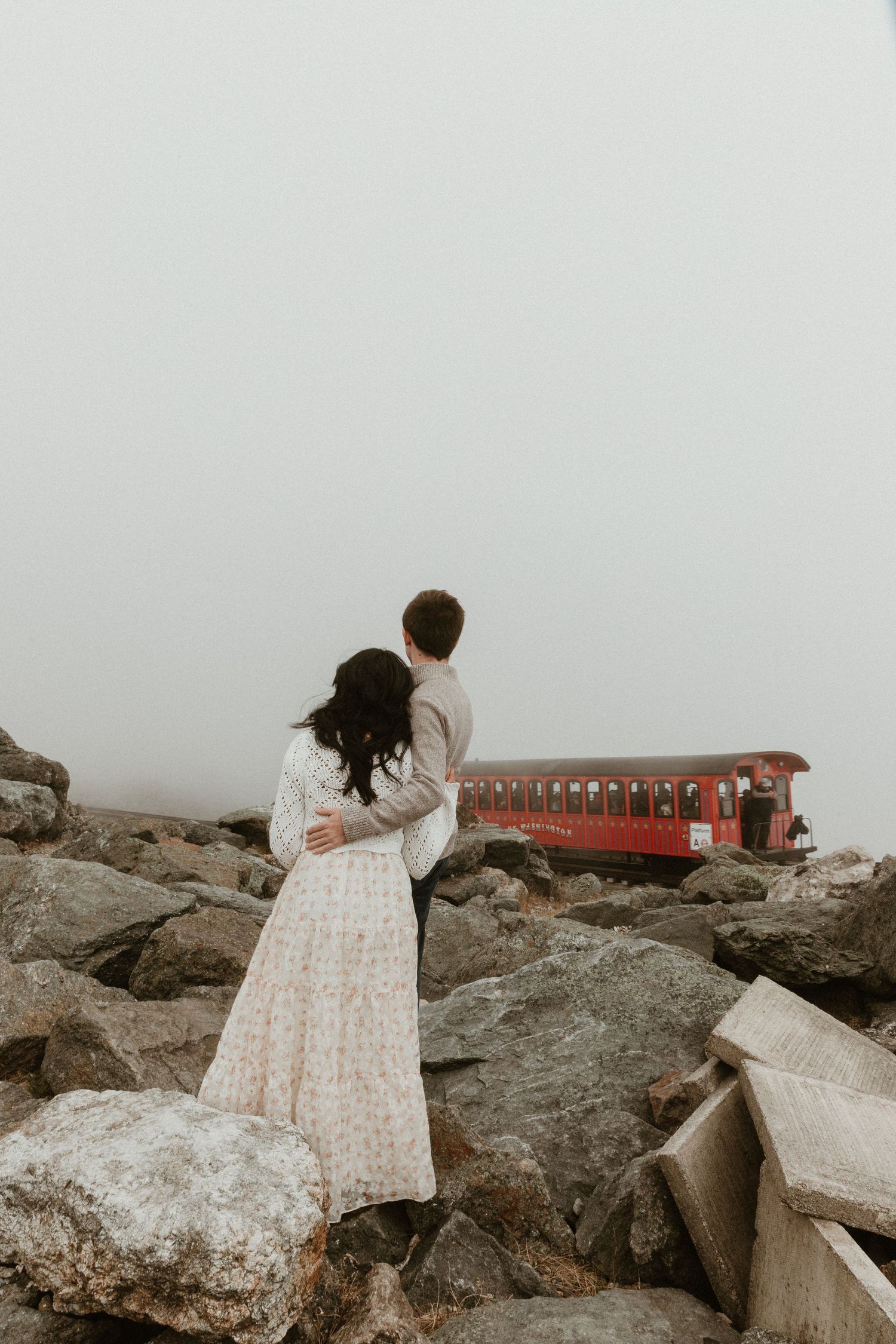 couple on mountain summit