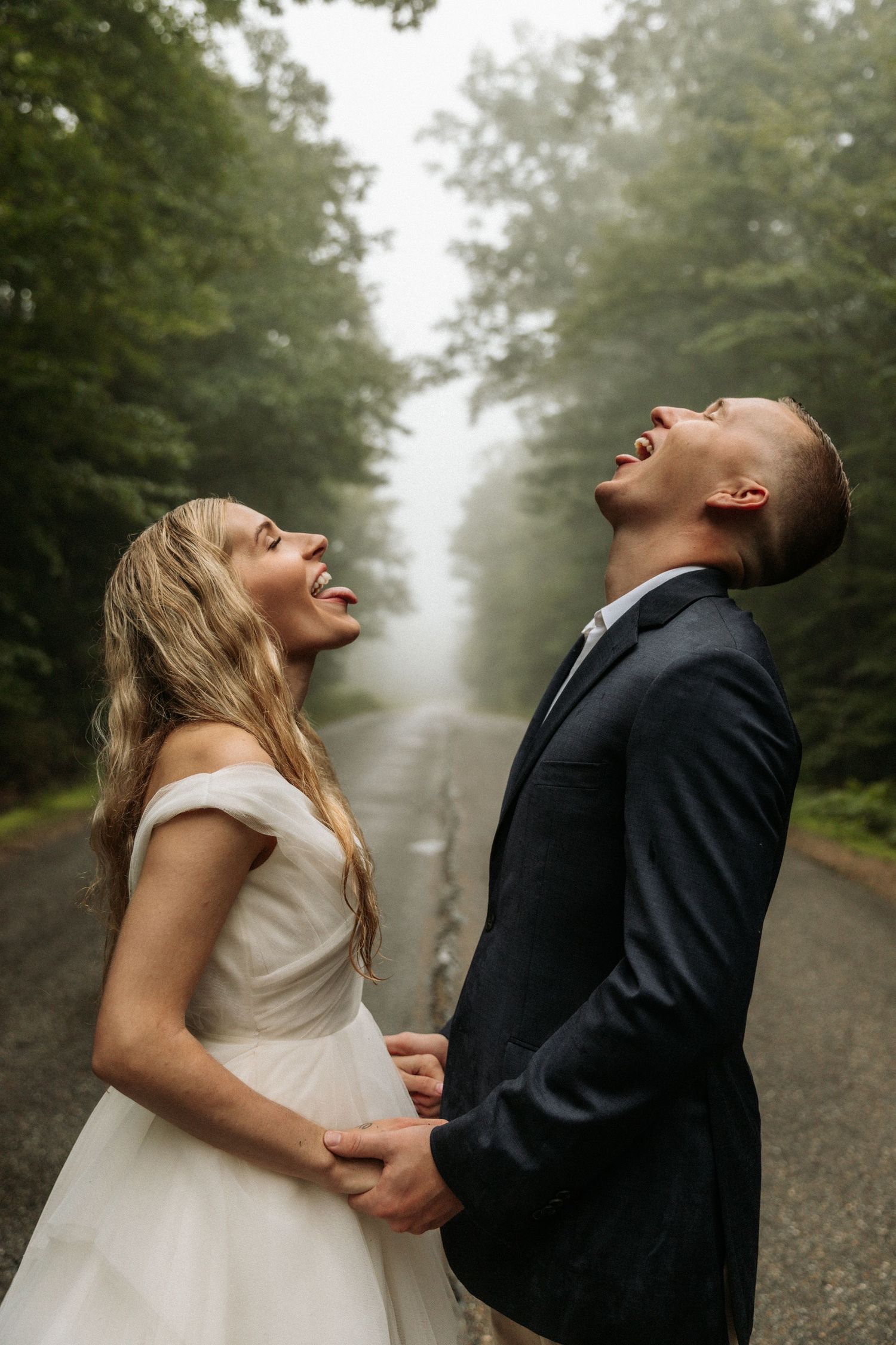 couple eloping in the rain