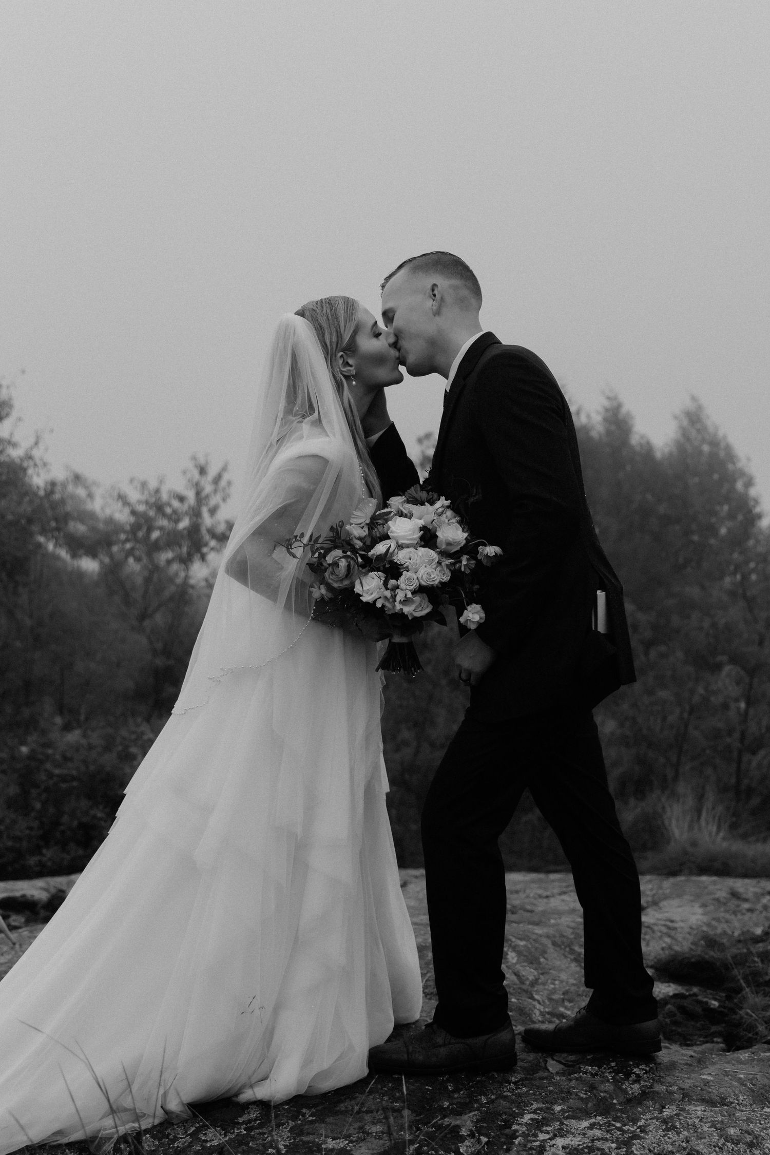 big kiss bride and groom