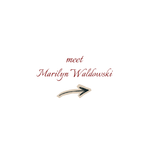Black arrow pointing to the right with decorative text elements in red and cursive font above and below.