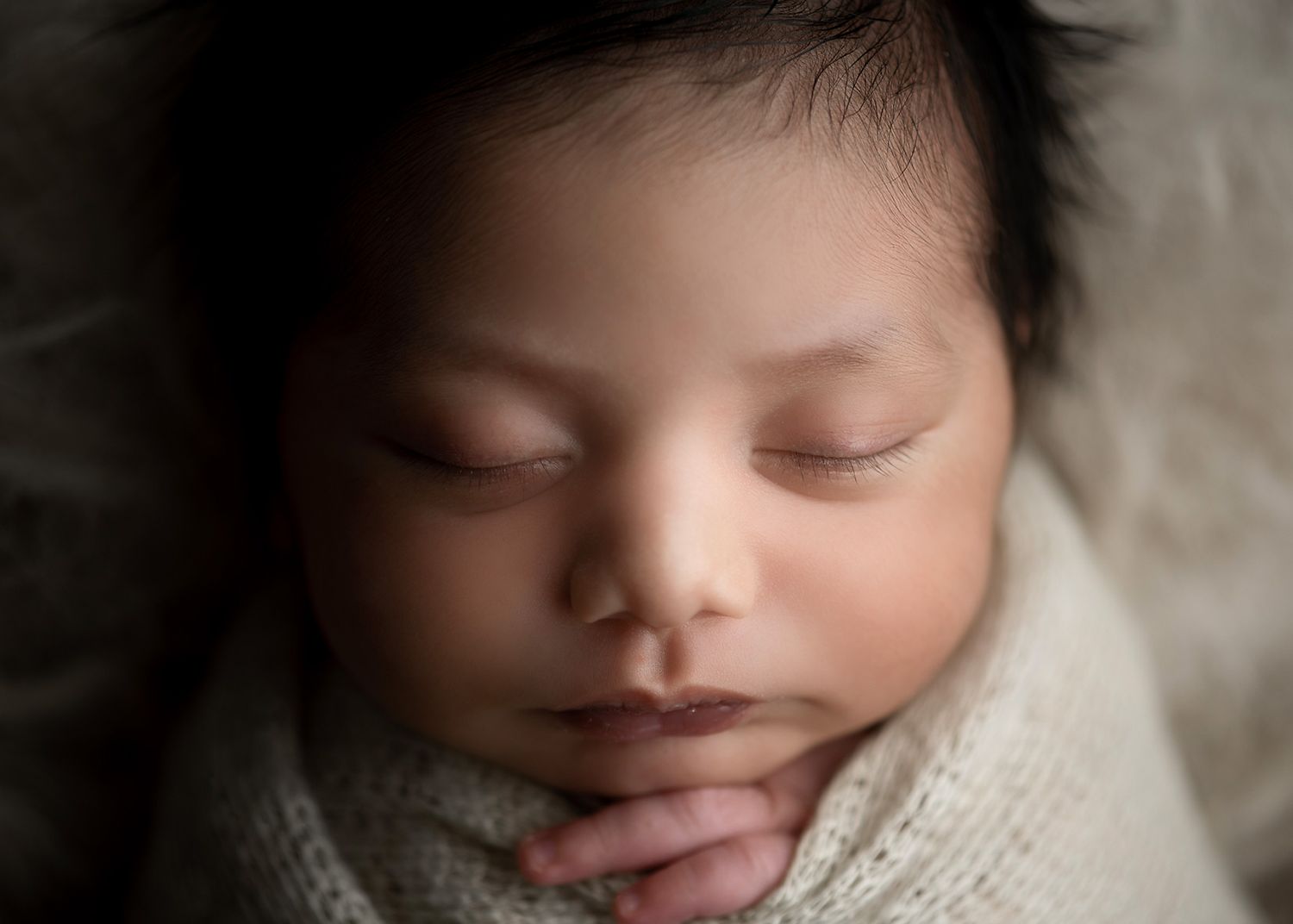 soft close-up newborn portrait focusing on baby's face and delicate features, Victoria BC