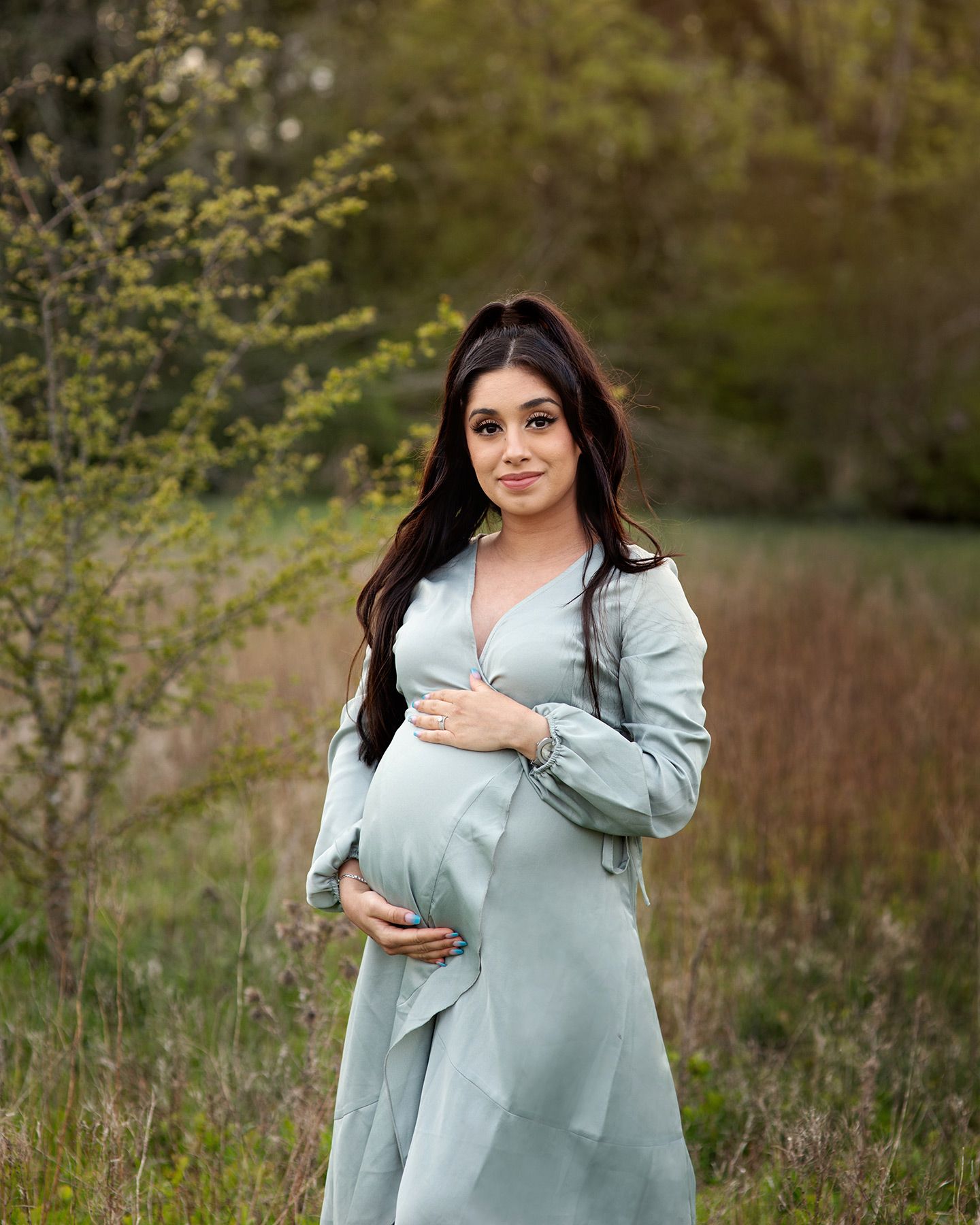 outdoor maternity session with mother-to-be in a wide grassy field, Victoria BC photography