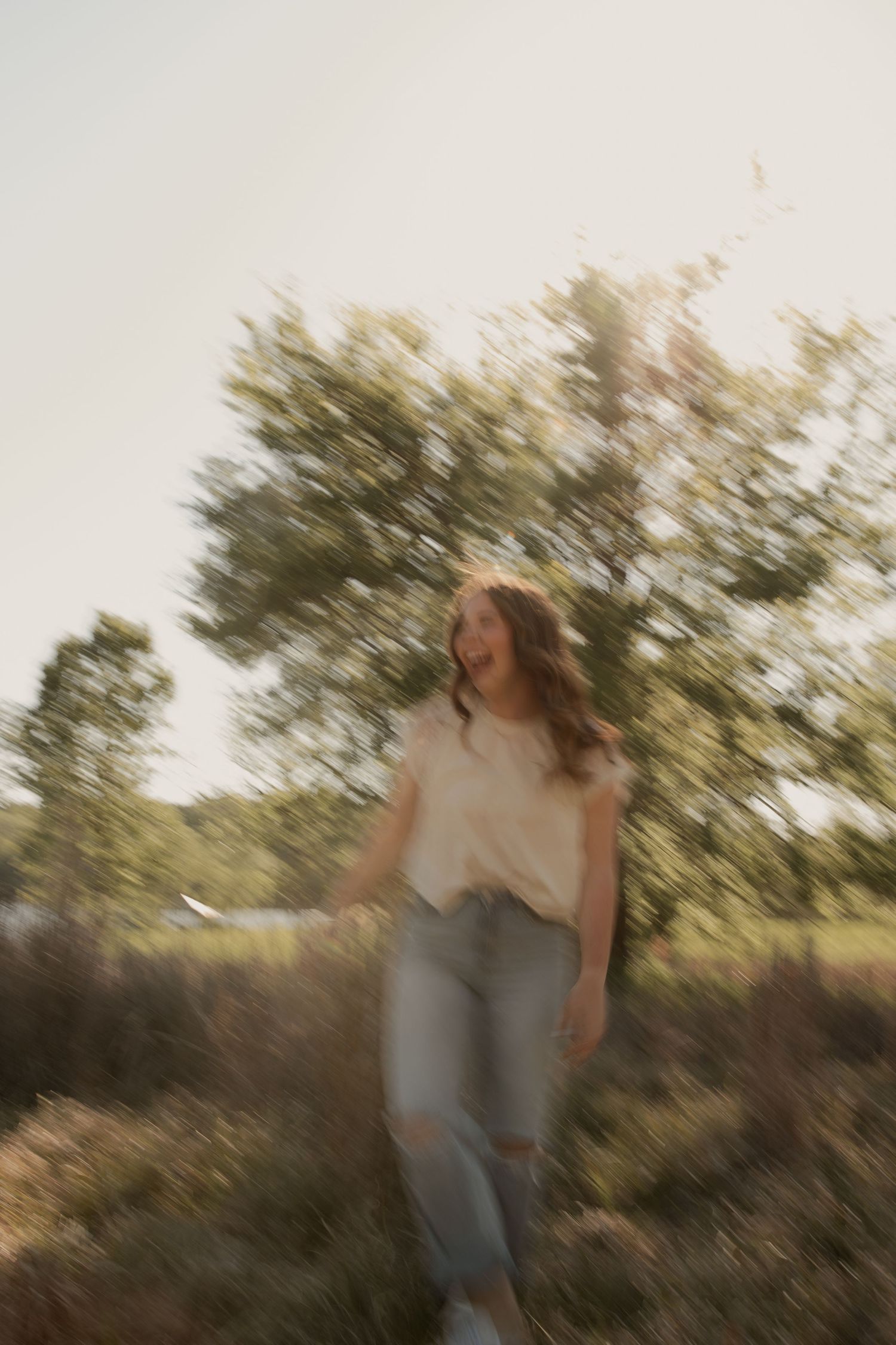 Artistic motion blur photography sequence in a natural outdoor setting during golden hour.