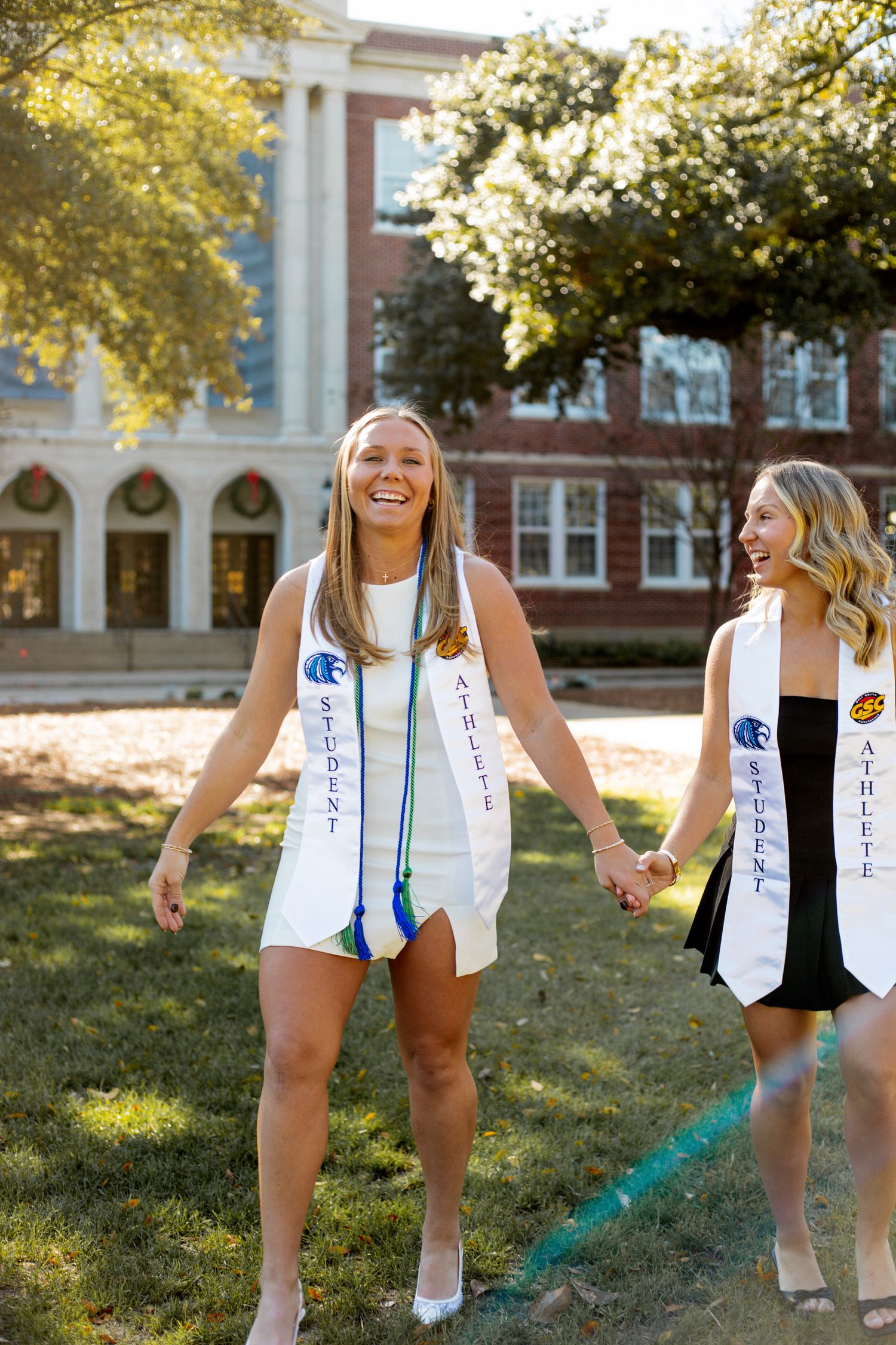 A celebratory graduation photo sequence with decorated stoles and colorful smoke effects.