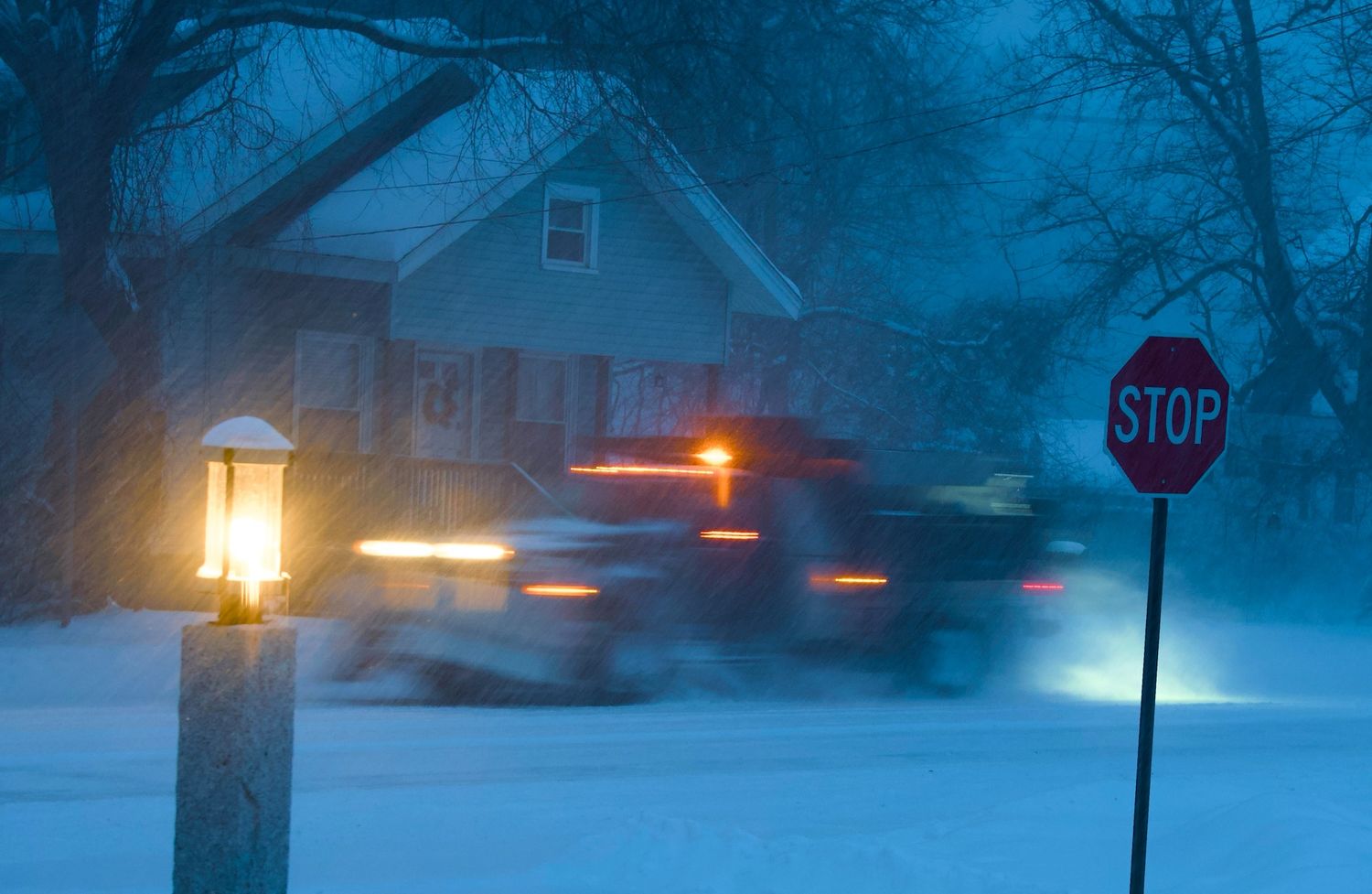Snowplow passing along Haverhill street.