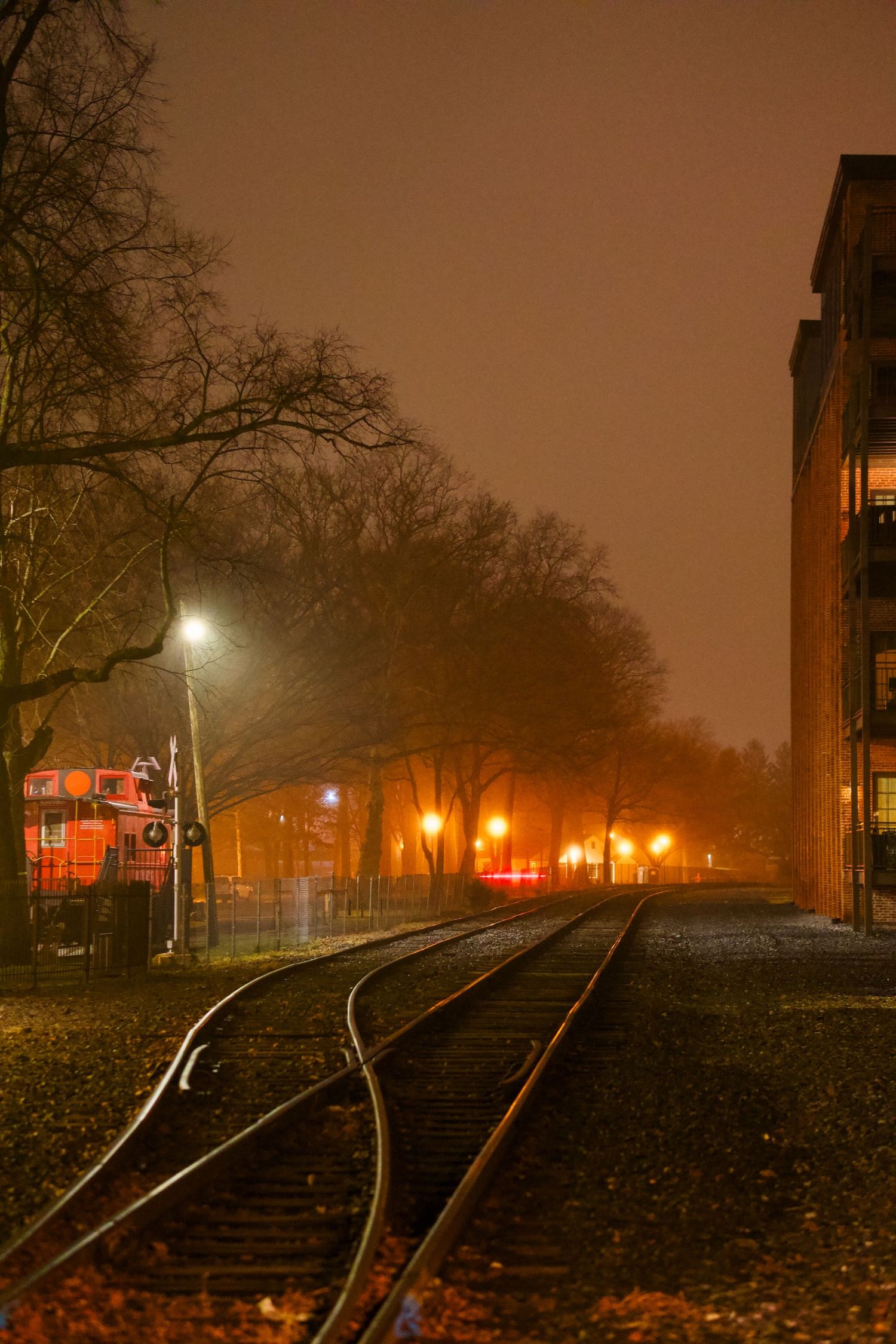Train tracks on a foggy night in Lititz.