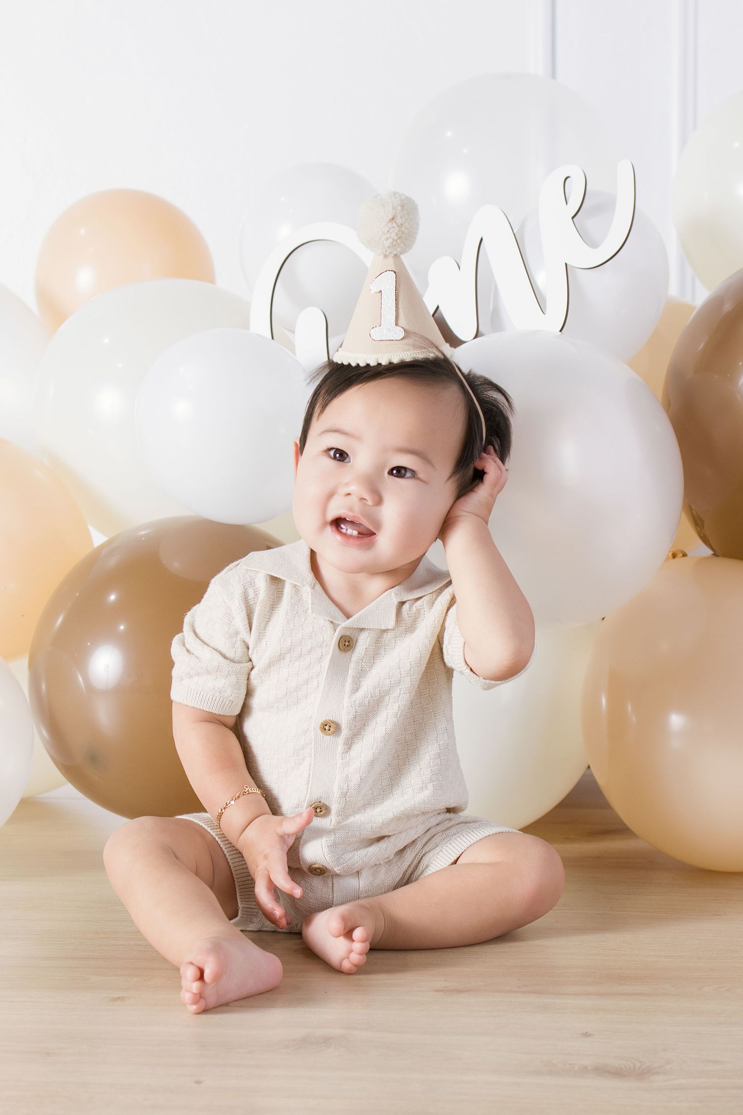 Smiling baby boy wearing a \