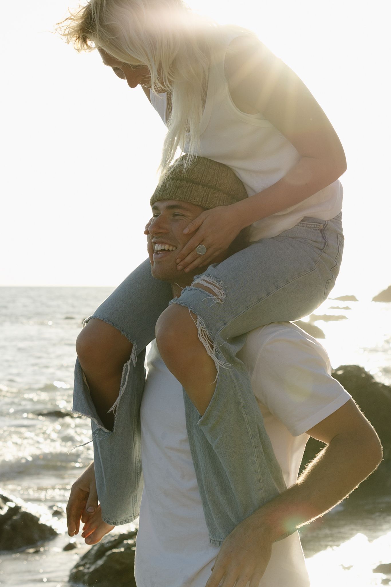 Romantic Ocean City NJ engagement portraits with soft ocean light