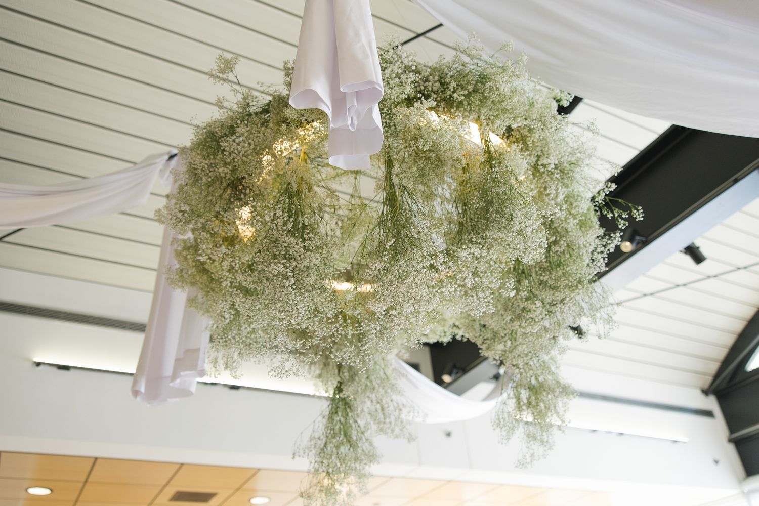 Elegant Liberty View wedding venue in Philadelphia featuring floor-to-ceiling windows, soft neutral tones, and a refined indoor reception se