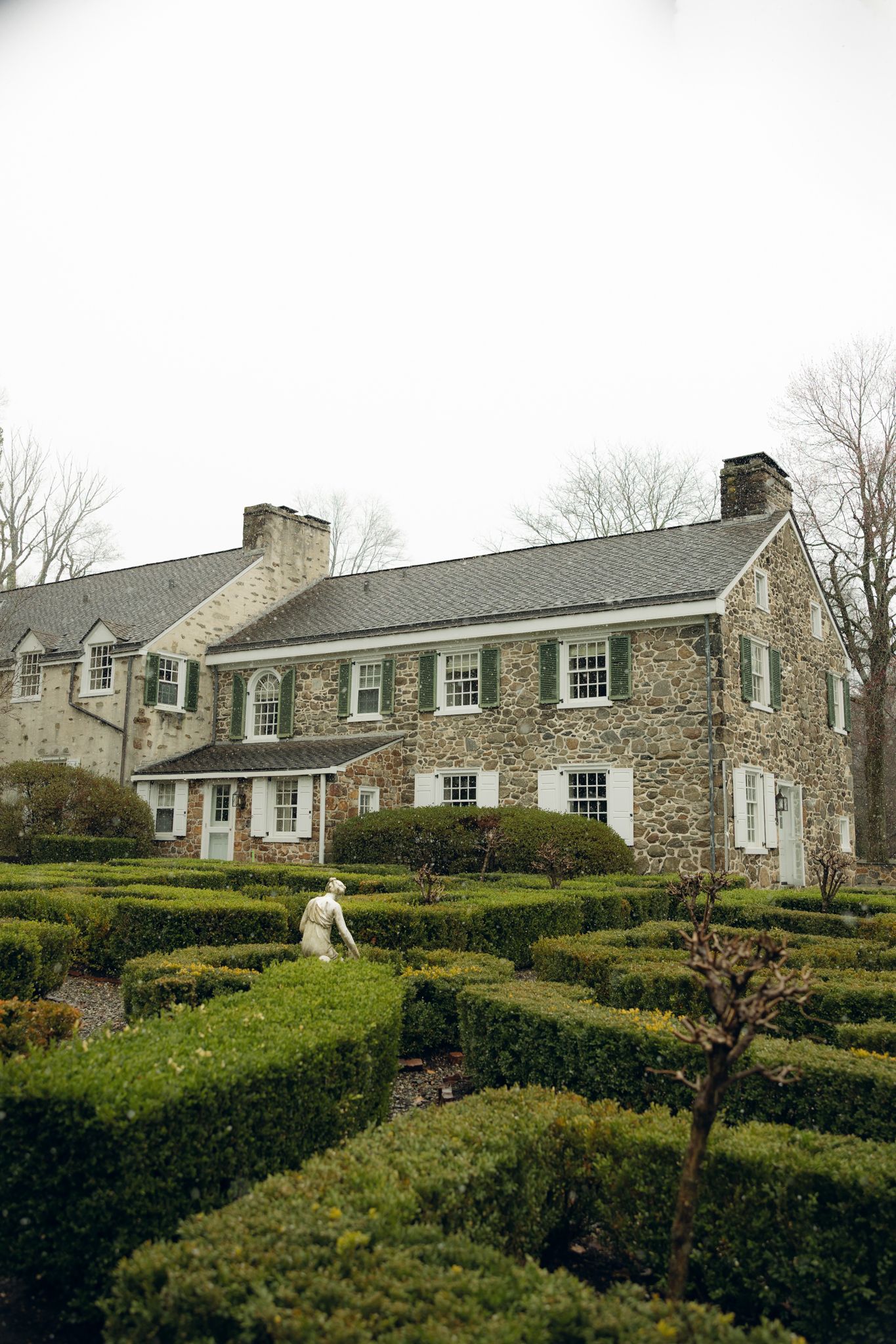 Appleford Estate engagement photos in Villanova Pennsylvania near Philadelphia, featuring a couple in a romantic garden setting