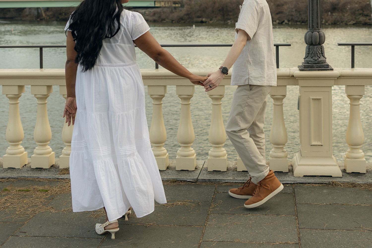 Engagement photography session at Fairmount Water Works Philadelphia with couple portraits by the Schuylkill River and iconic architecture,