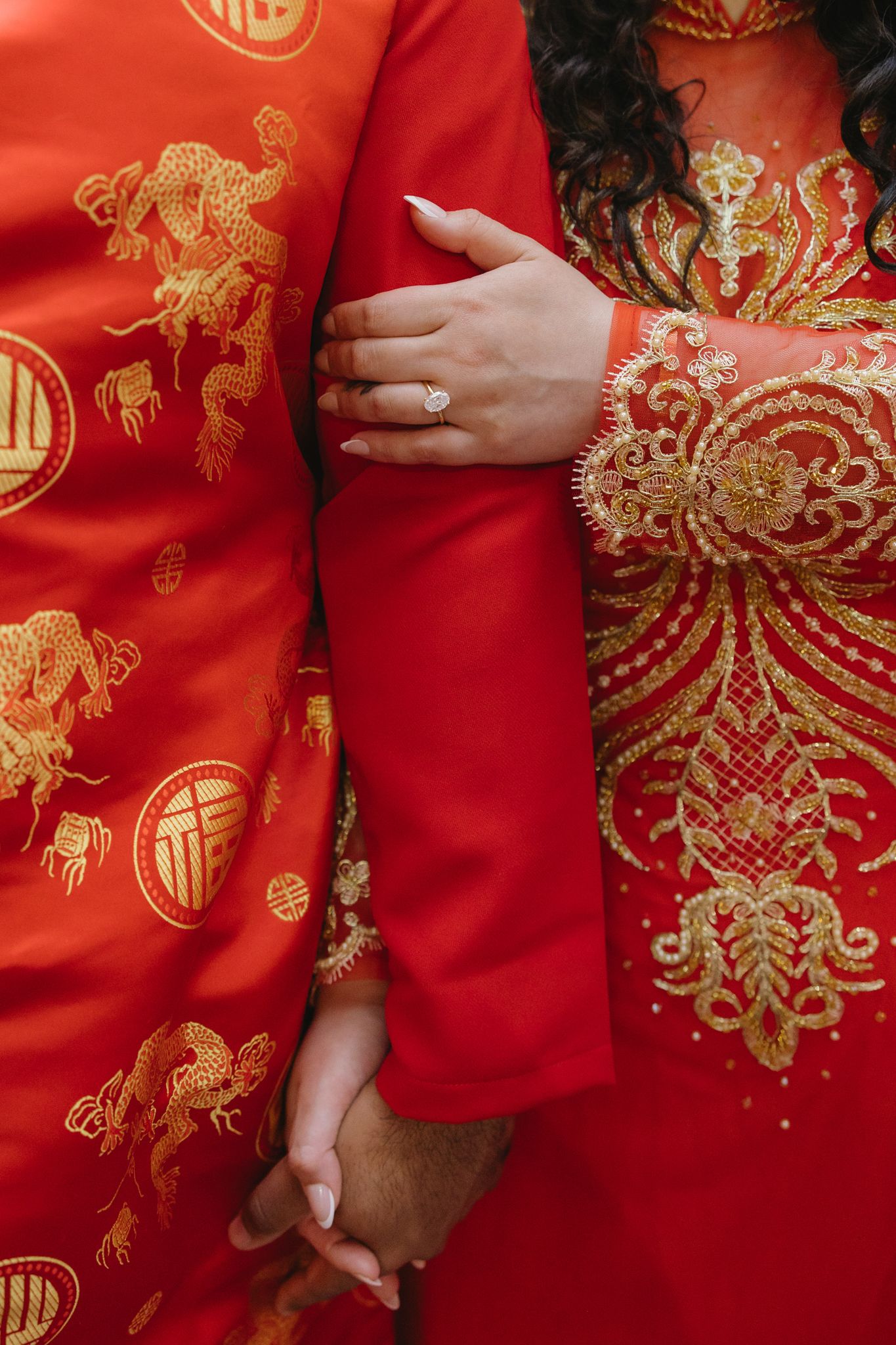 Couple laughing together during an engagement session in Philadelphia Chinatown with city lights and historic architecture-6.jpg
