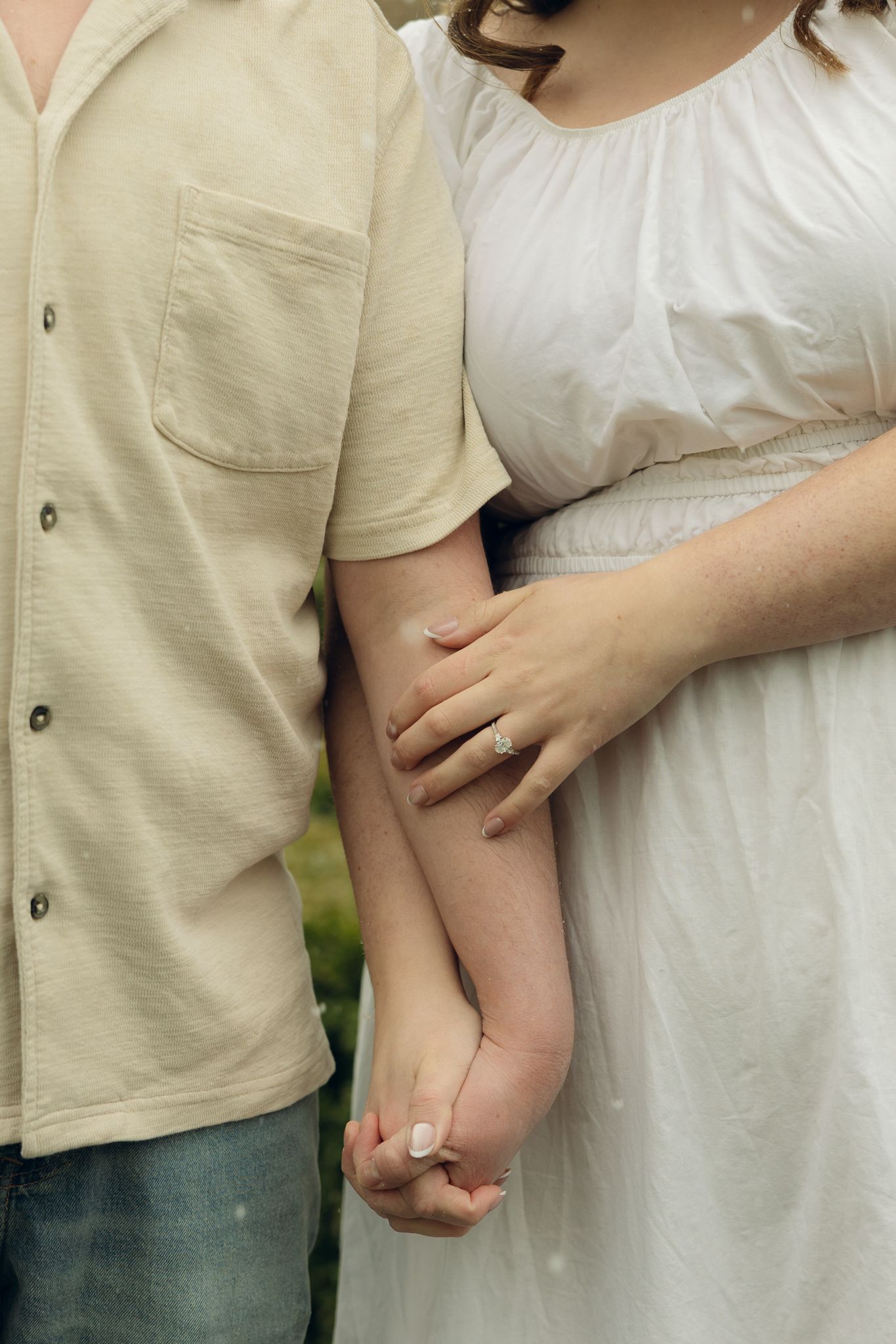 Romantic engagement photos at Appleford Estate near Philadelphia featuring a couple walking through lush gardens and historic architecture