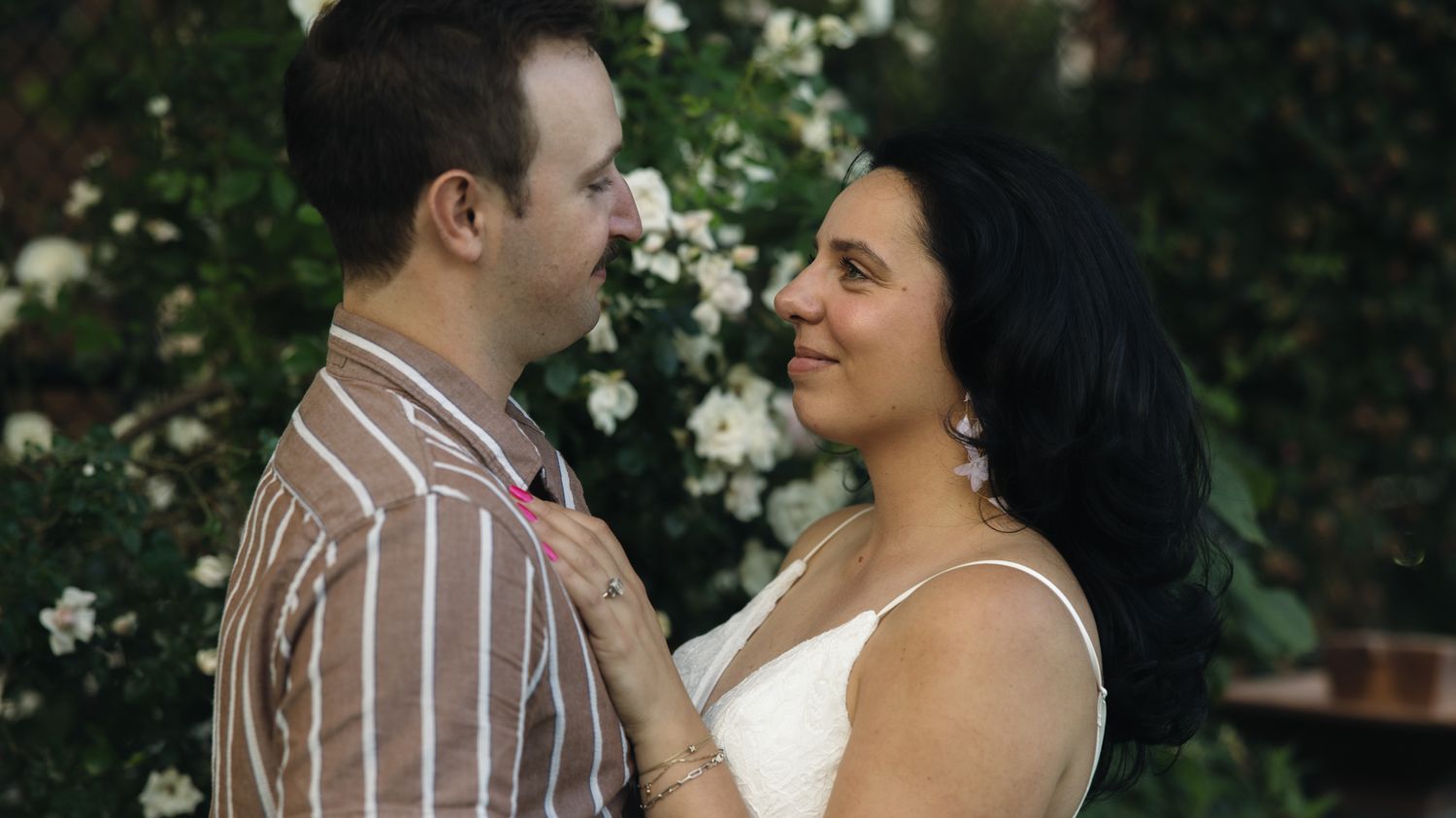Couple holding hands during an engagement session at Rittenhouse Square in Philadelphia, Pennsylvania-3.jpg