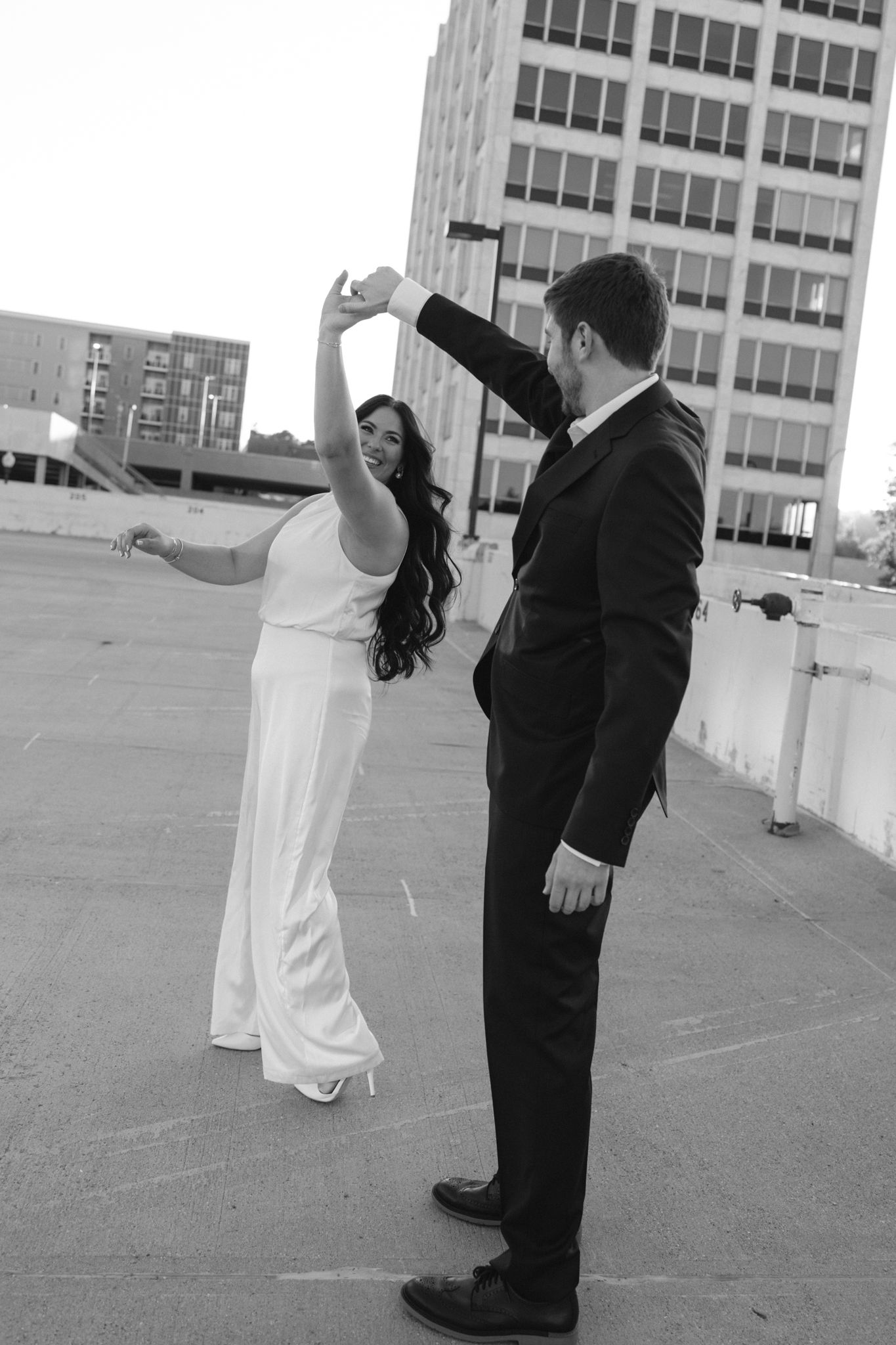 Timeless engagement photos of couple laughing in center city philadelphia