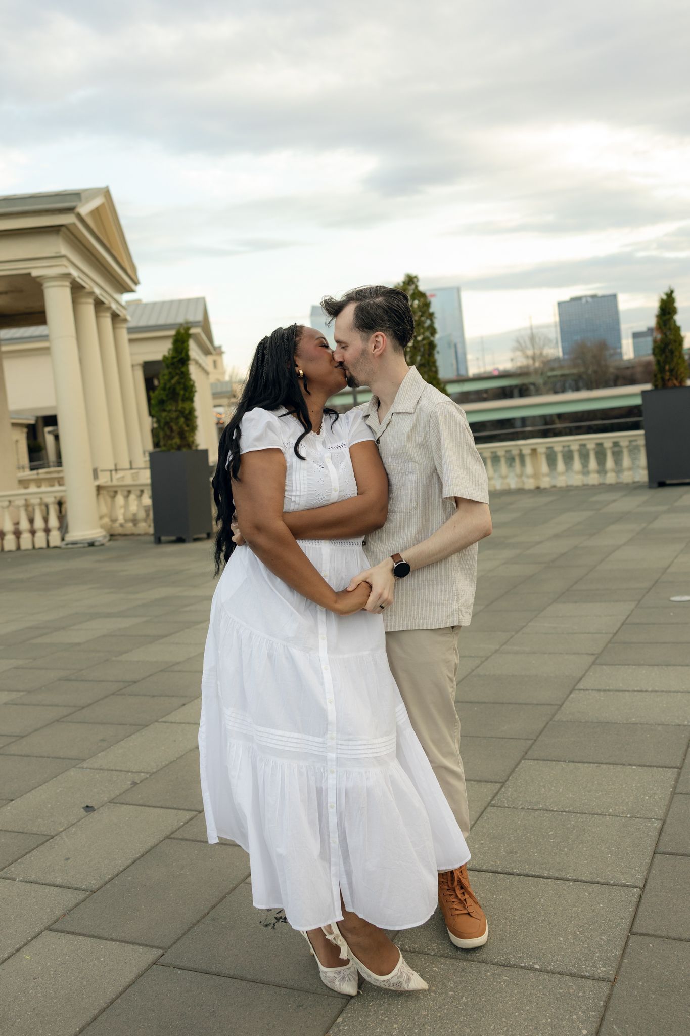 Engagement photography session at Fairmount Water Works Philadelphia with couple portraits by the Schuylkill River and iconic architecture,