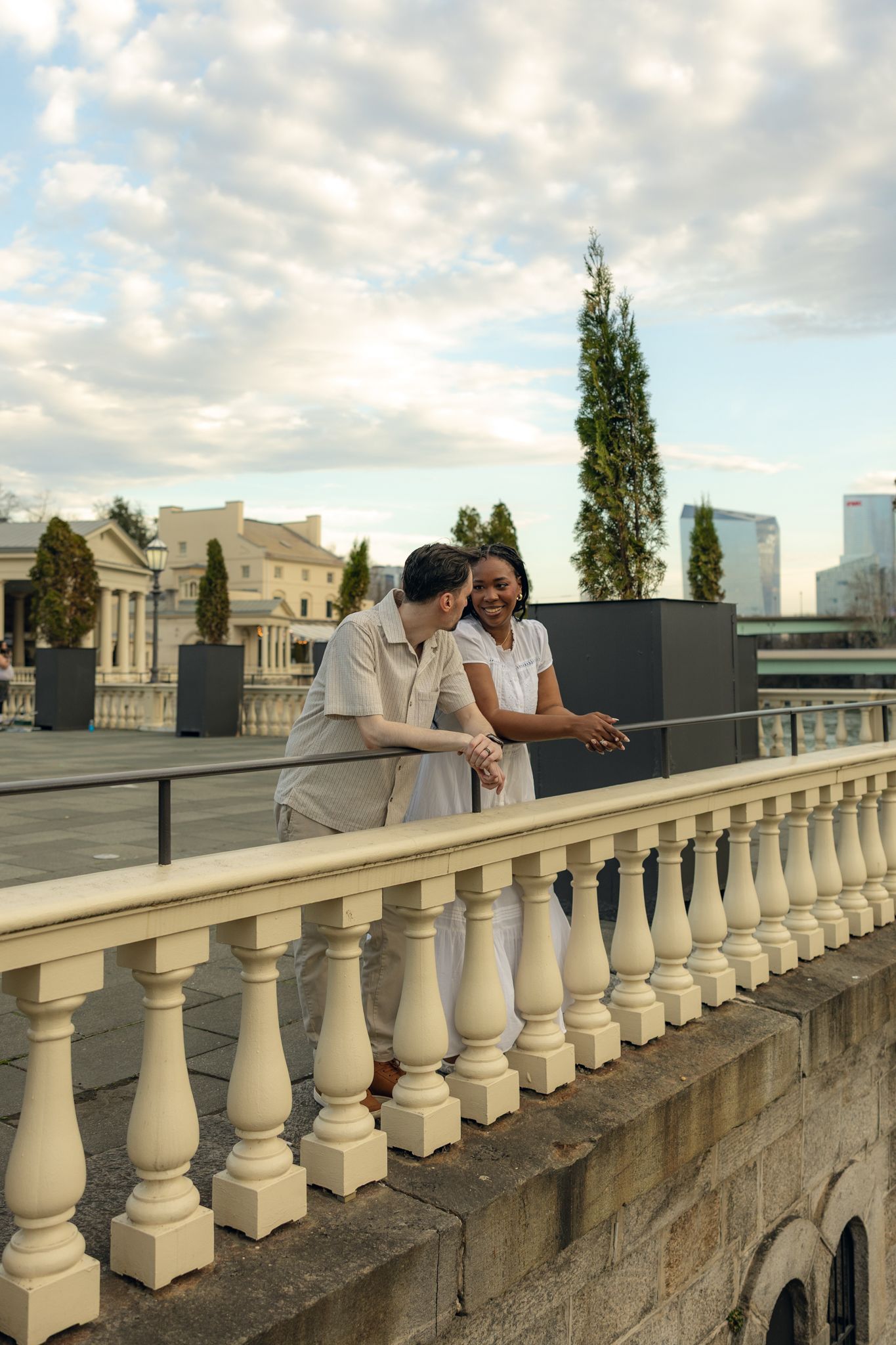 Engagement photography session at Fairmount Water Works Philadelphia with couple portraits by the Schuylkill River and iconic architecture,