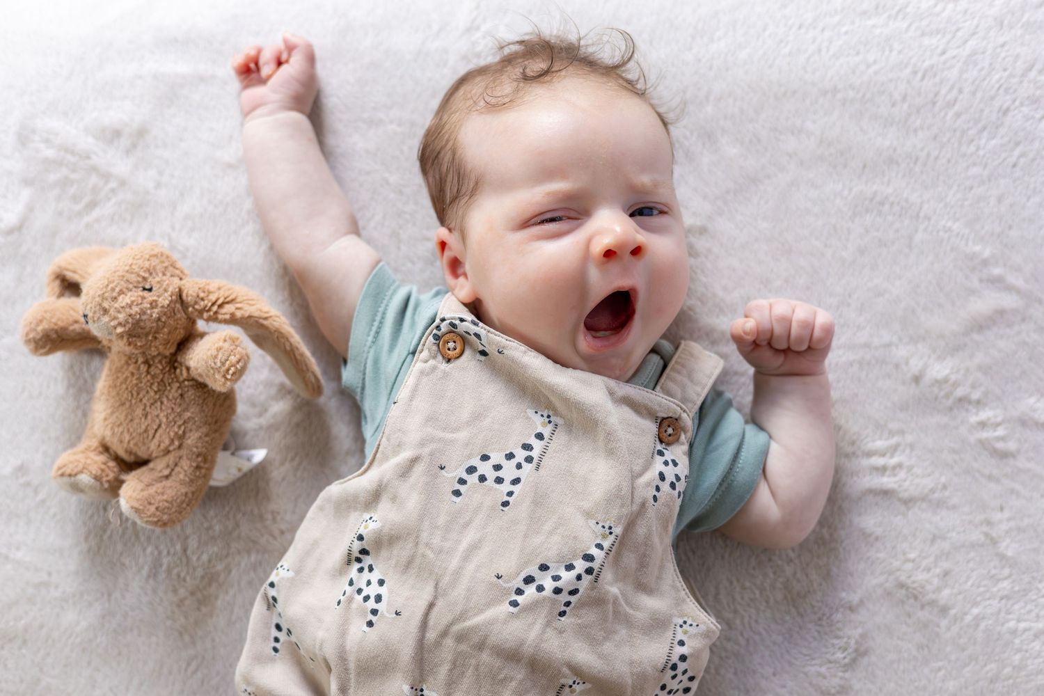baby yawning and stretching