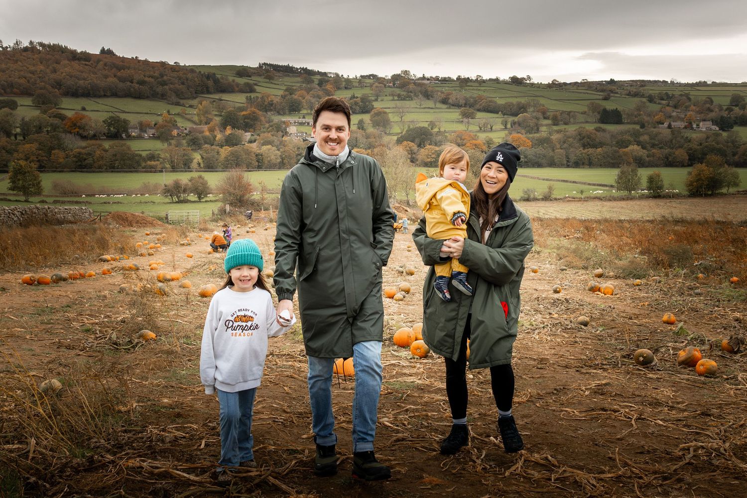 Family in a pumpkin patch