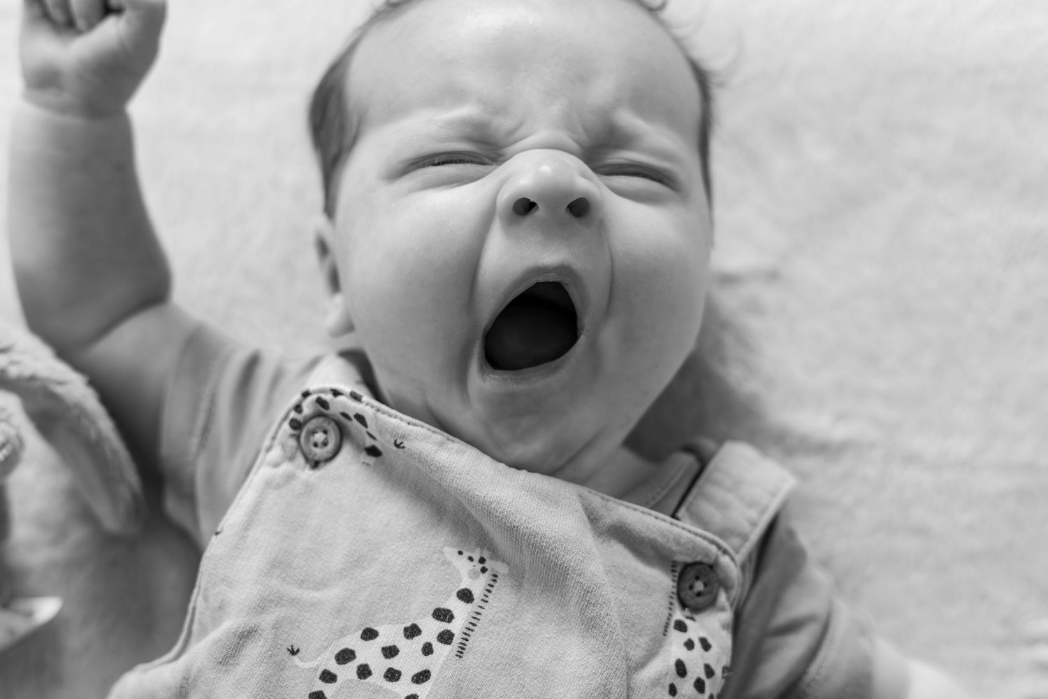 baby yawning and stretching