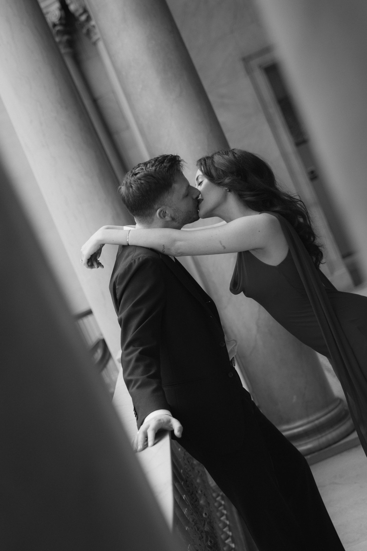 A black and white photo sequence showing a couple dancing together in an intimate embrace.