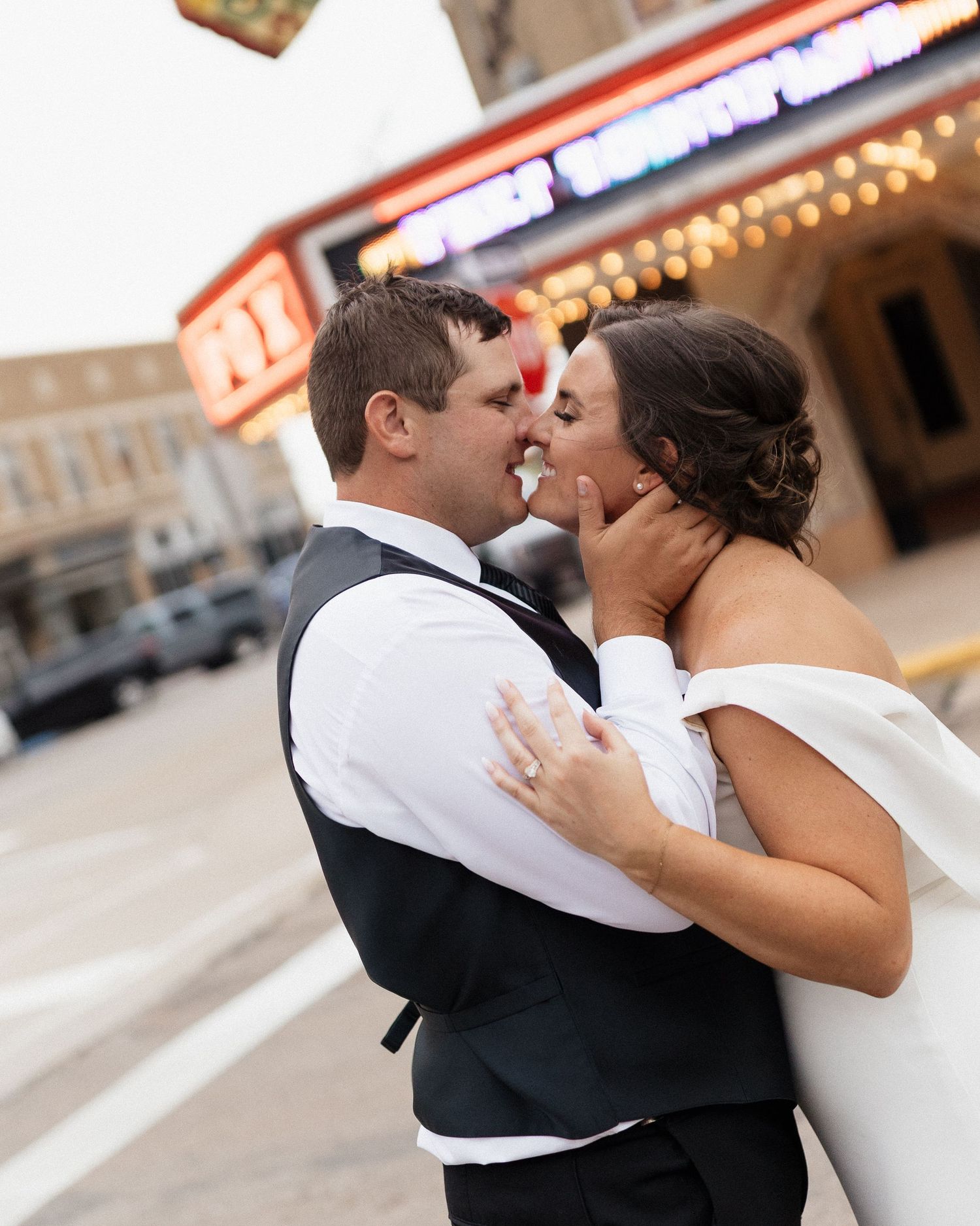 A couple shares a romantic dance moment together at their wedding reception.