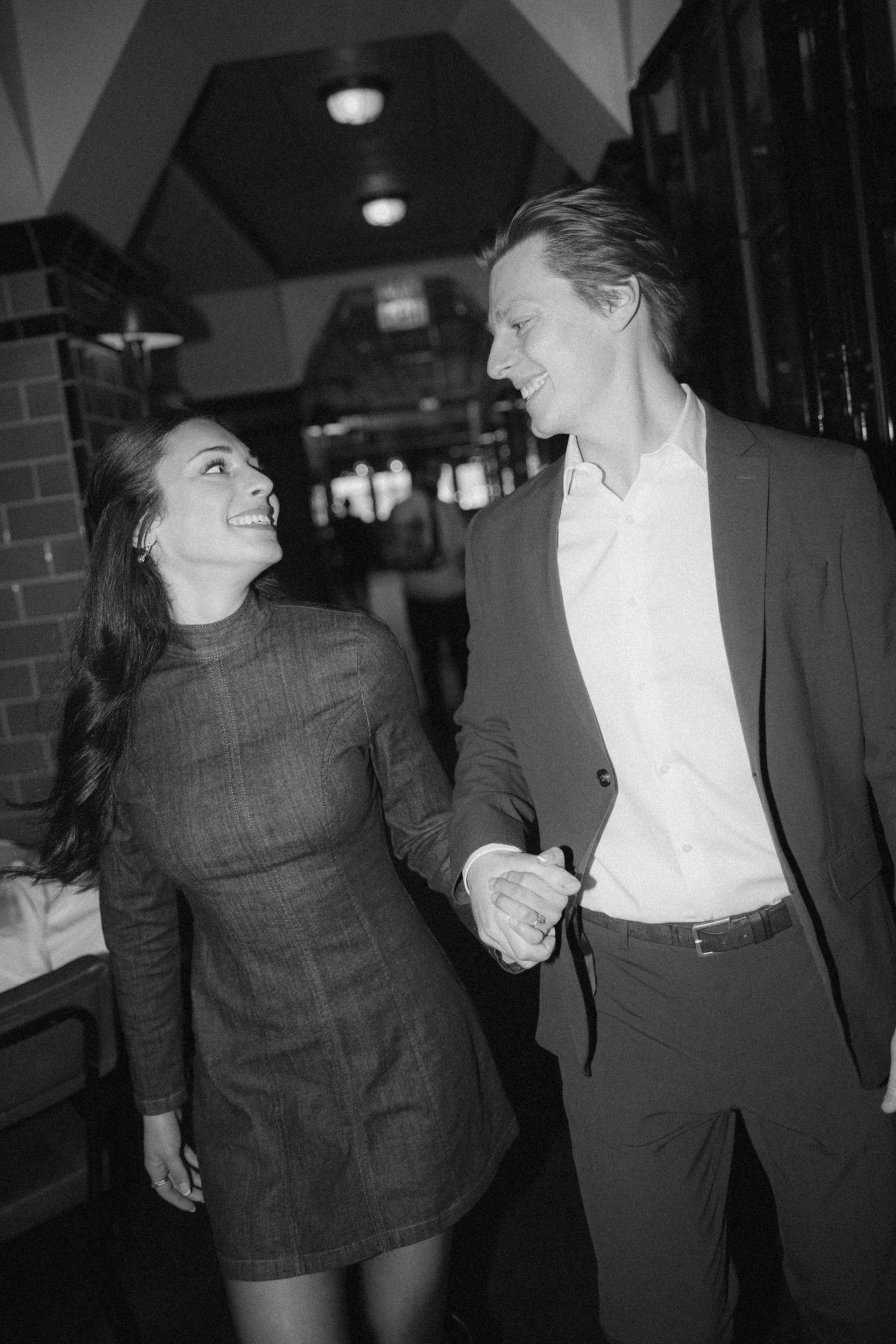 A black and white photo sequence shows two people dancing together in a social setting.