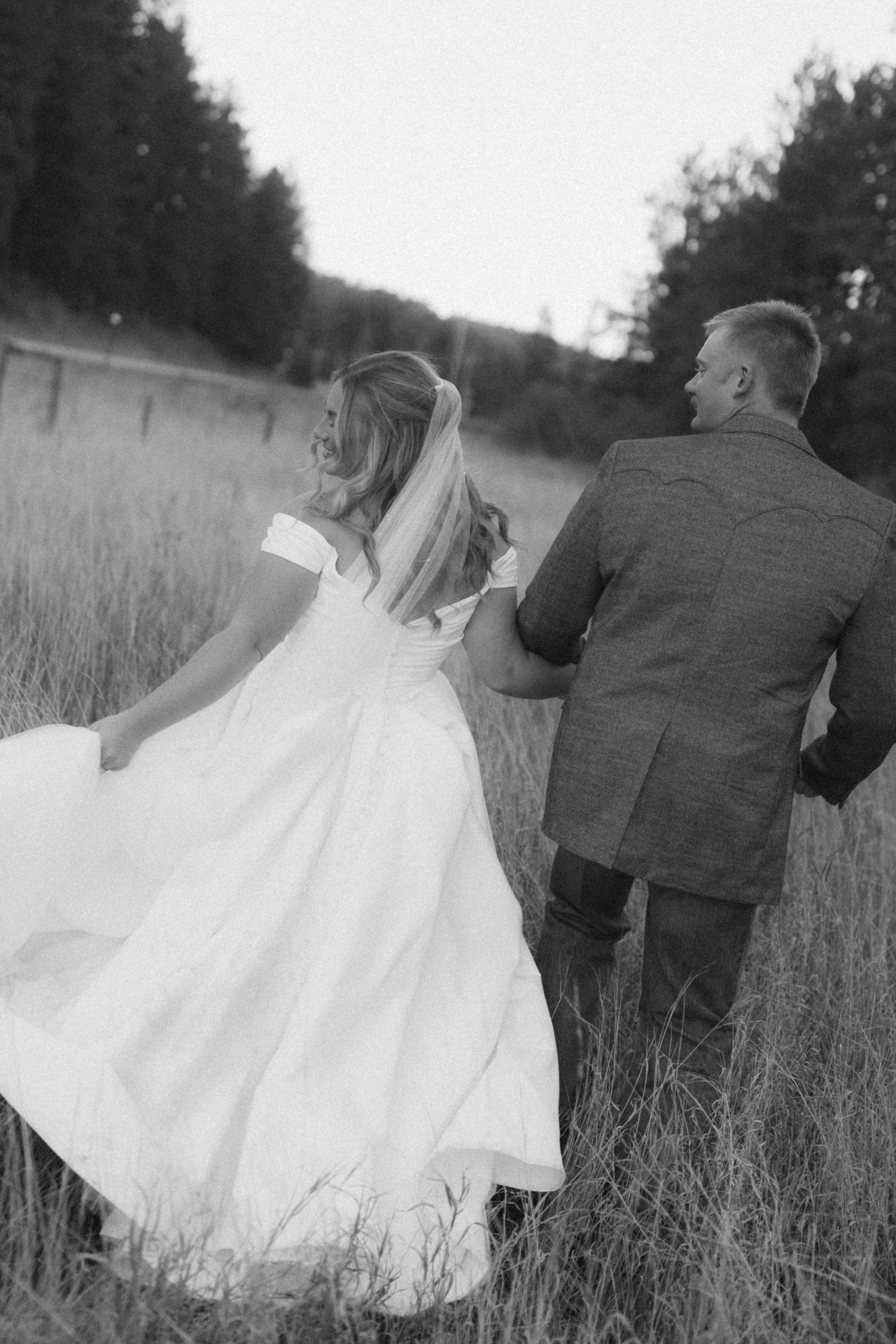 Series of romantic moments captured in a rustic field setting.