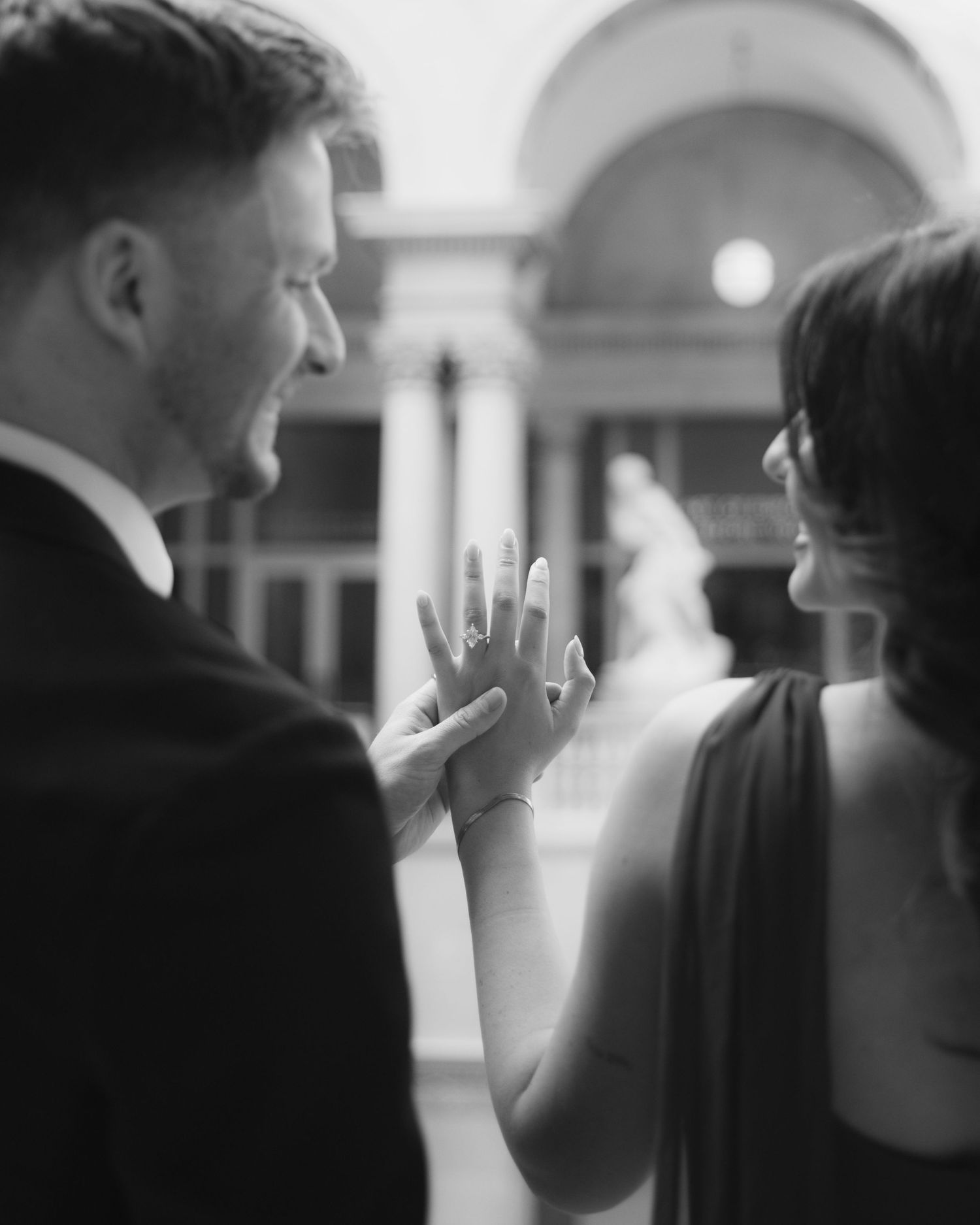 A series of black and white images showing couples in formal attire at what appears to be an elegant indoor event.