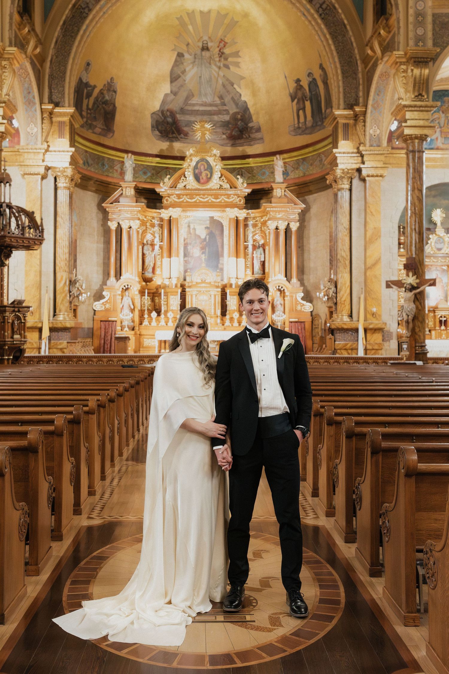 A sequence of wedding photos taken inside an ornate Catholic church with golden details and painted ceilings.