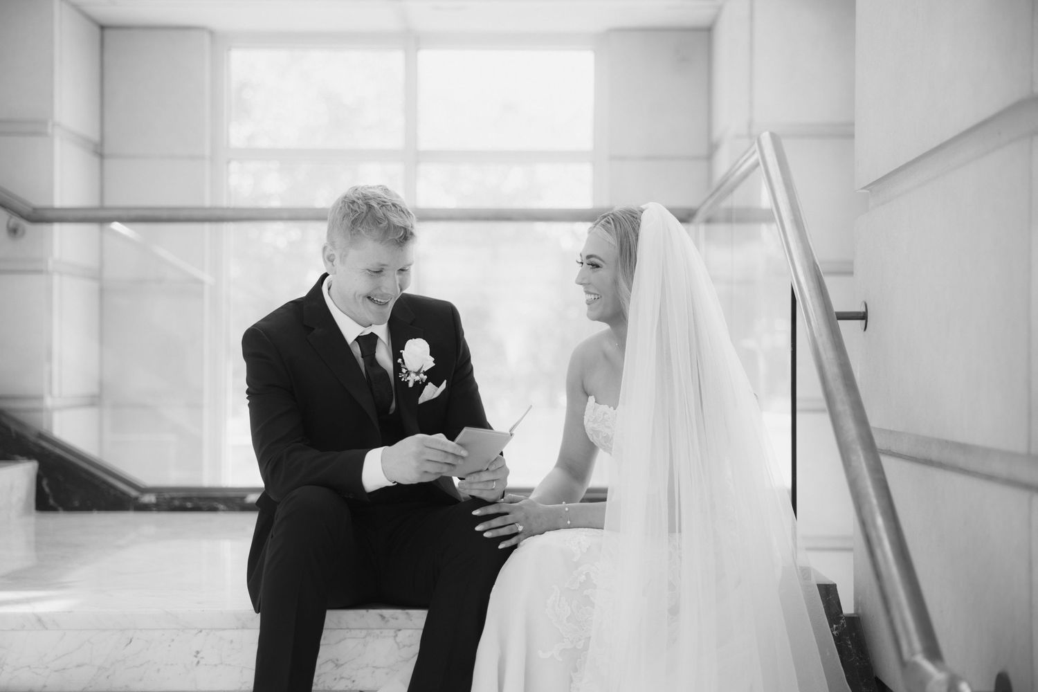 A black and white wedding photo collage showing intimate moments between a couple in formal attire.