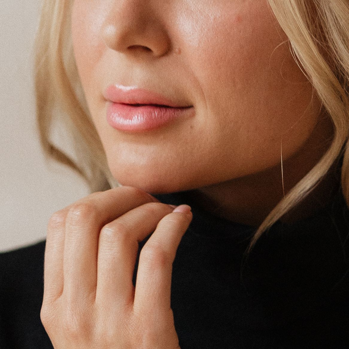 Close-up series showing fingers delicately touching lips and chin in soft, natural lighting.