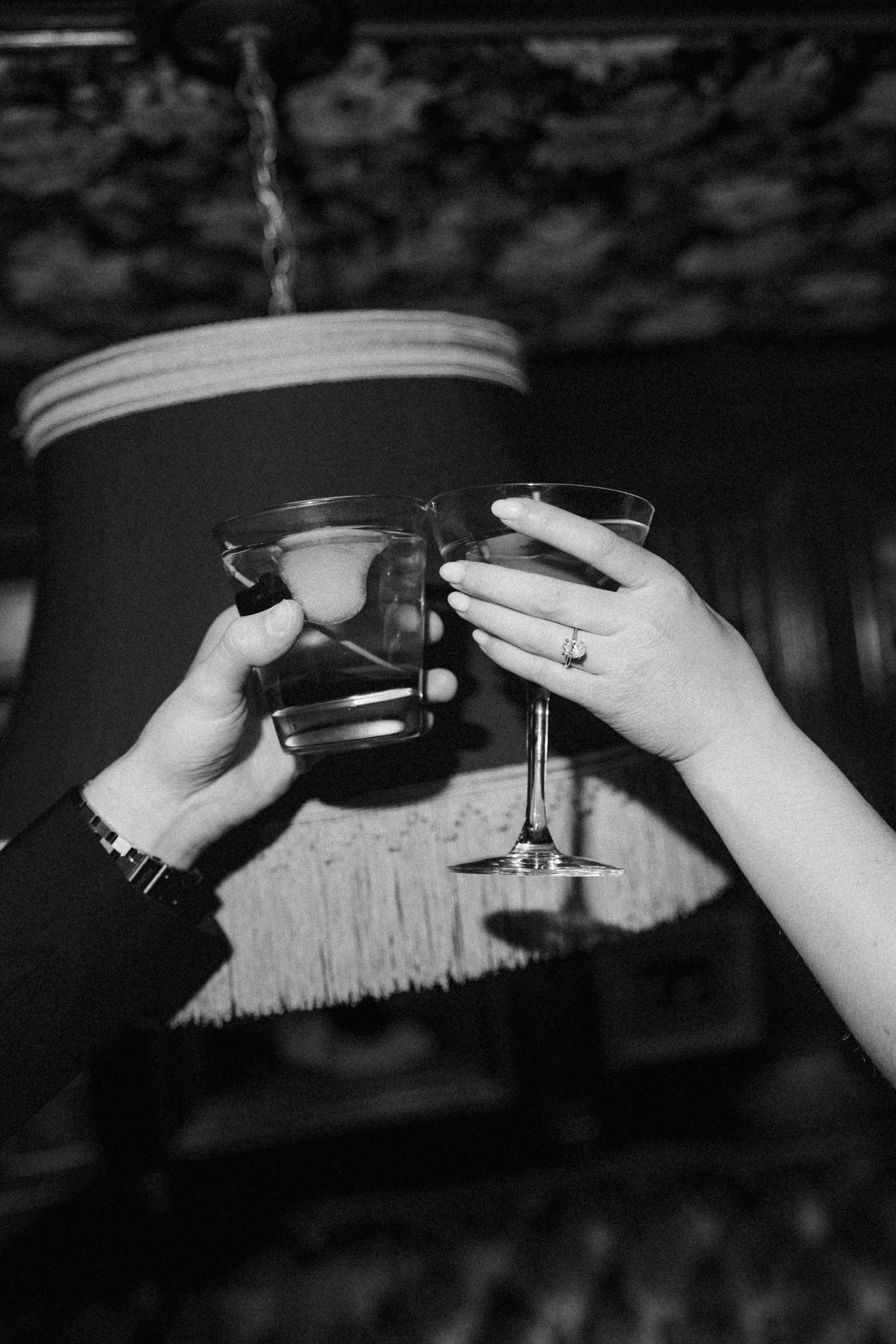 Black and white sequence showing hands preparing and lighting a cigarette in close-up detail.