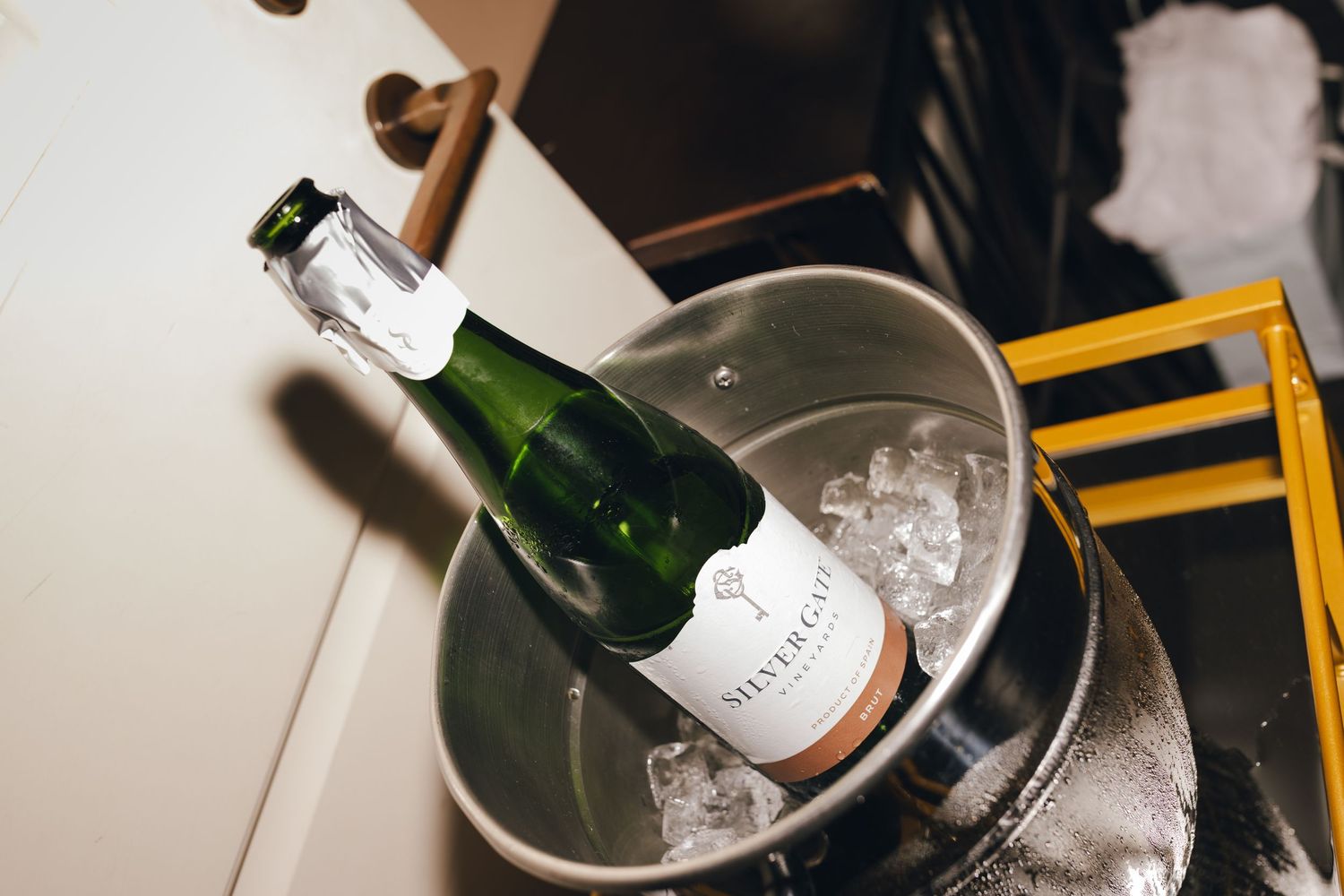 Champagne bottles chilling in ice buckets at a luxurious celebration or event.