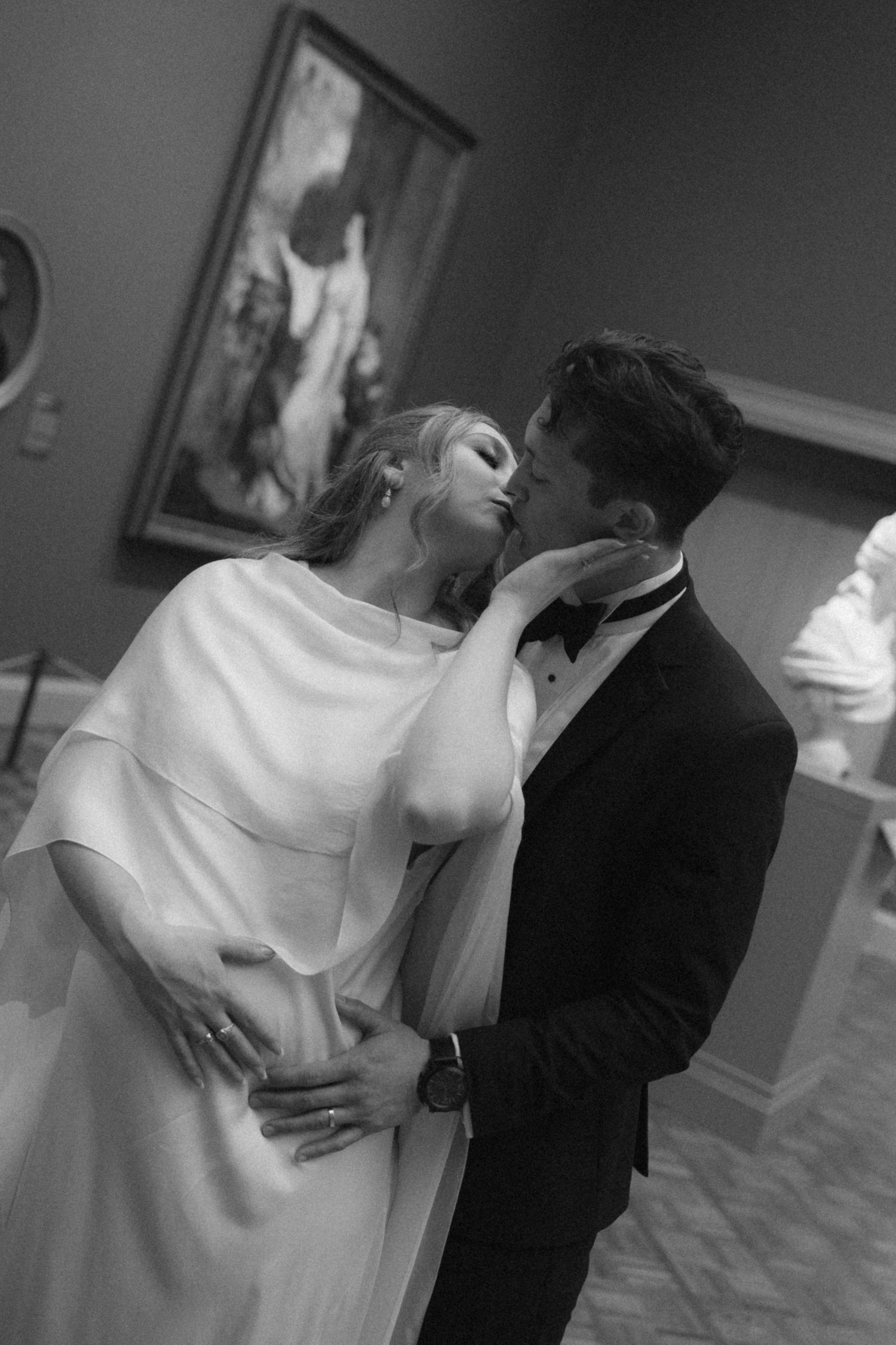 A sequence of romantic black and white wedding dance photos showing an intimate moment between newlyweds.