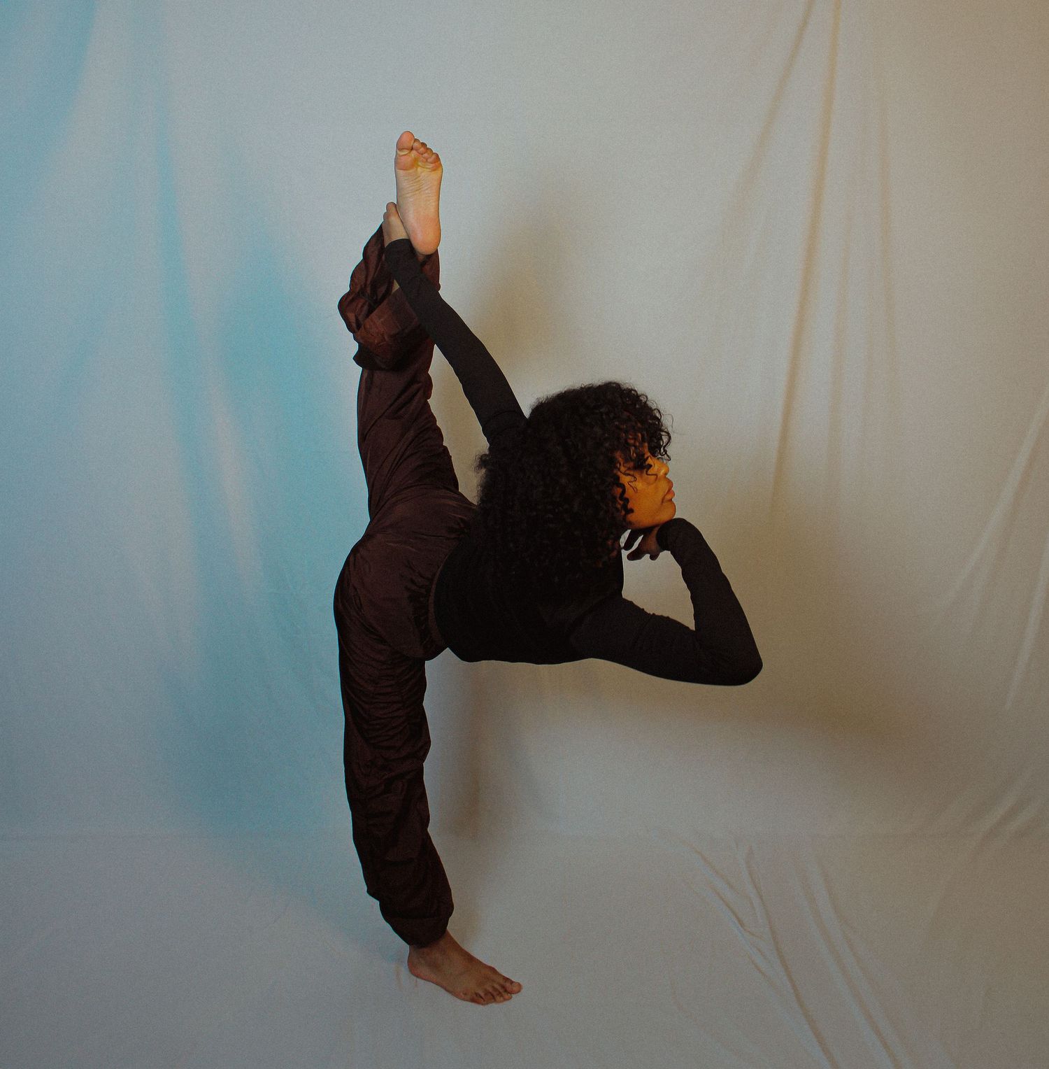 Expressive dance movements captured in a series against a light backdrop.