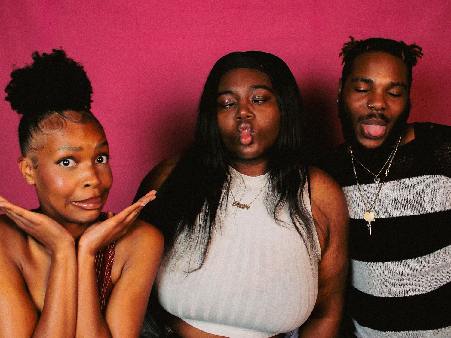 Studio portrait series captures fun, expressive moments between two people.