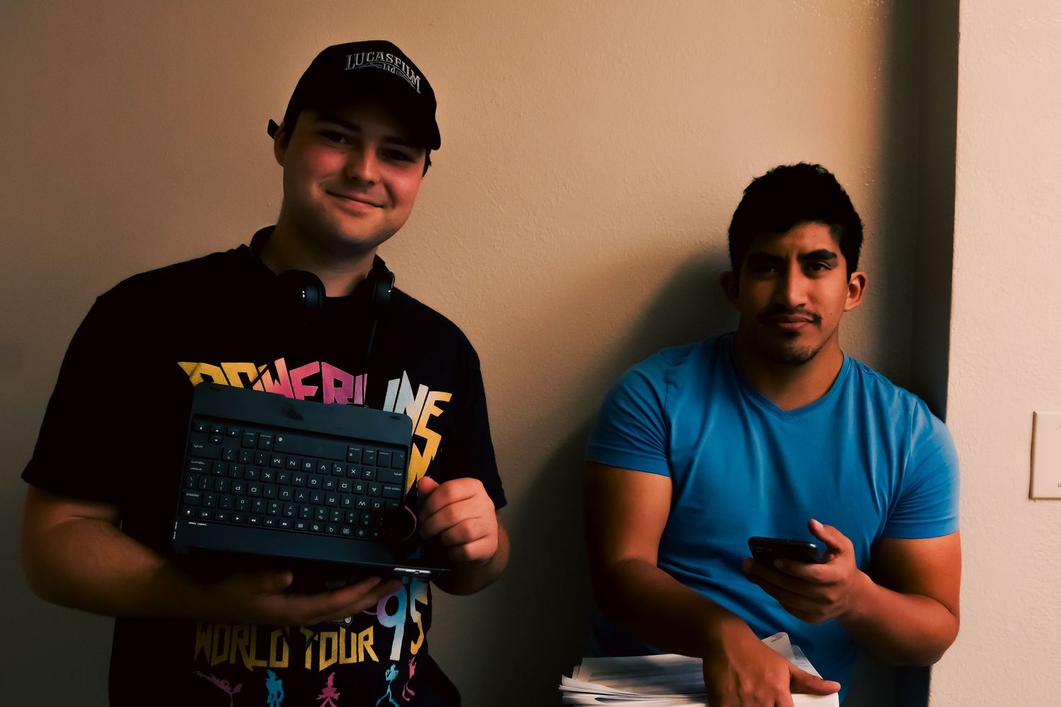 Film crew members gather in casual attire during a video production shoot.