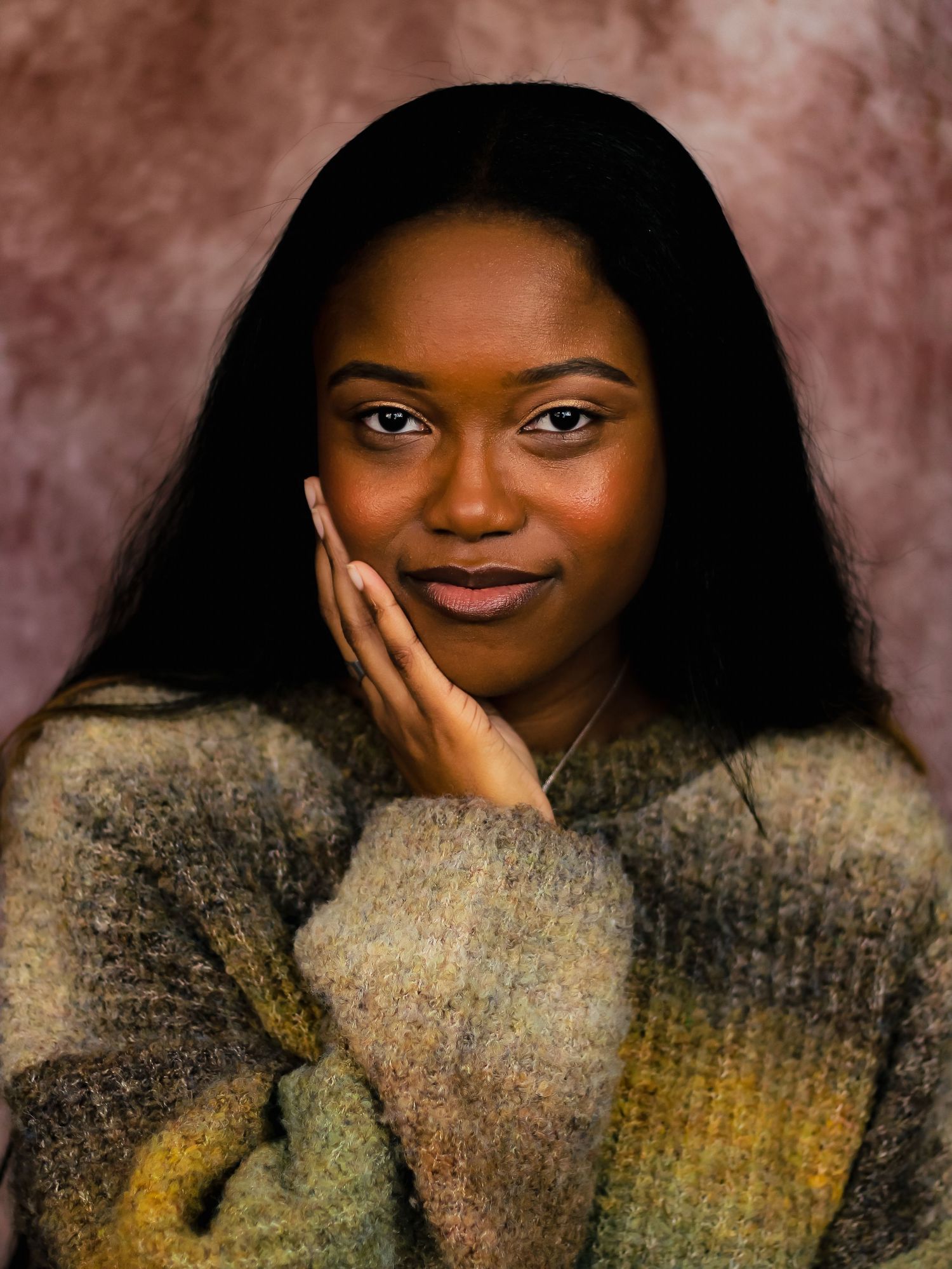 Cozy portrait series featuring warm sweater and natural expressions.